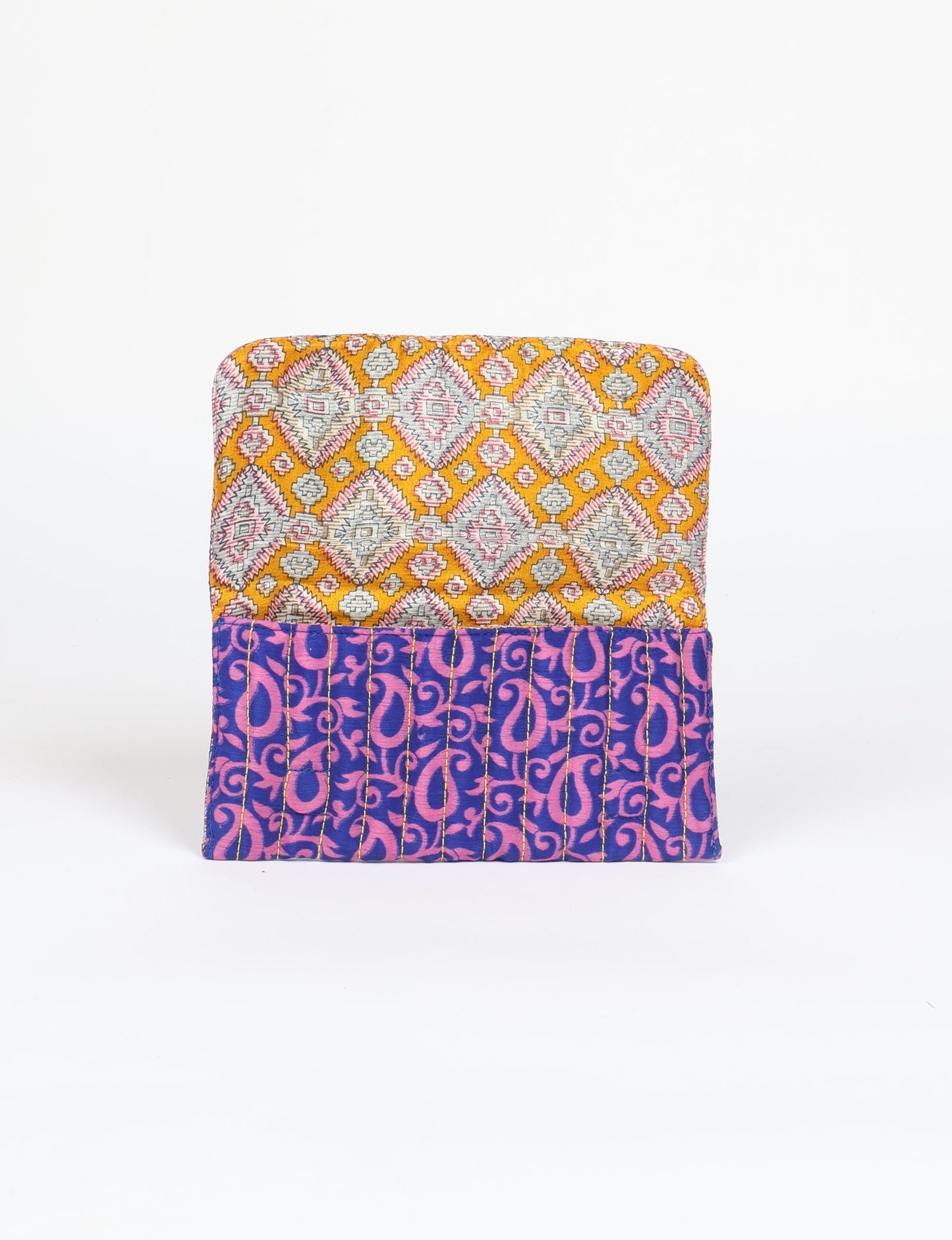 Quilted sunglasses case made from recycled sari products, featuring a secure magnetic closure. A chic example of ethical fashion, conscious clothing, and carbon neutral fashion. Protect your sunglasses while embracing circular fashion and upcycled garments.