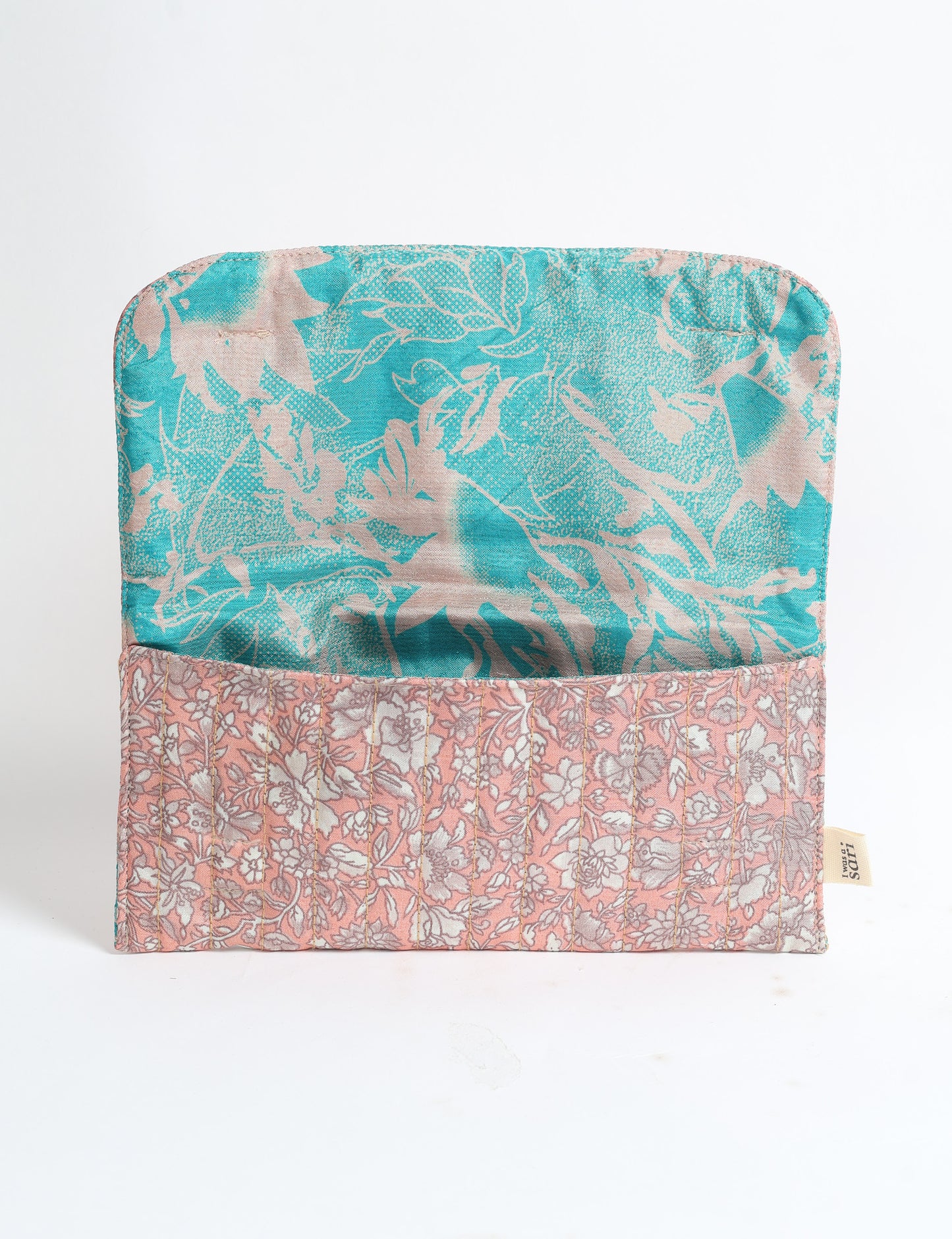 Quilted sunglasses case made from recycled sari products, featuring a secure magnetic closure. A chic example of ethical fashion, conscious clothing, and carbon neutral fashion. Protect your sunglasses while embracing circular fashion and upcycled garments.