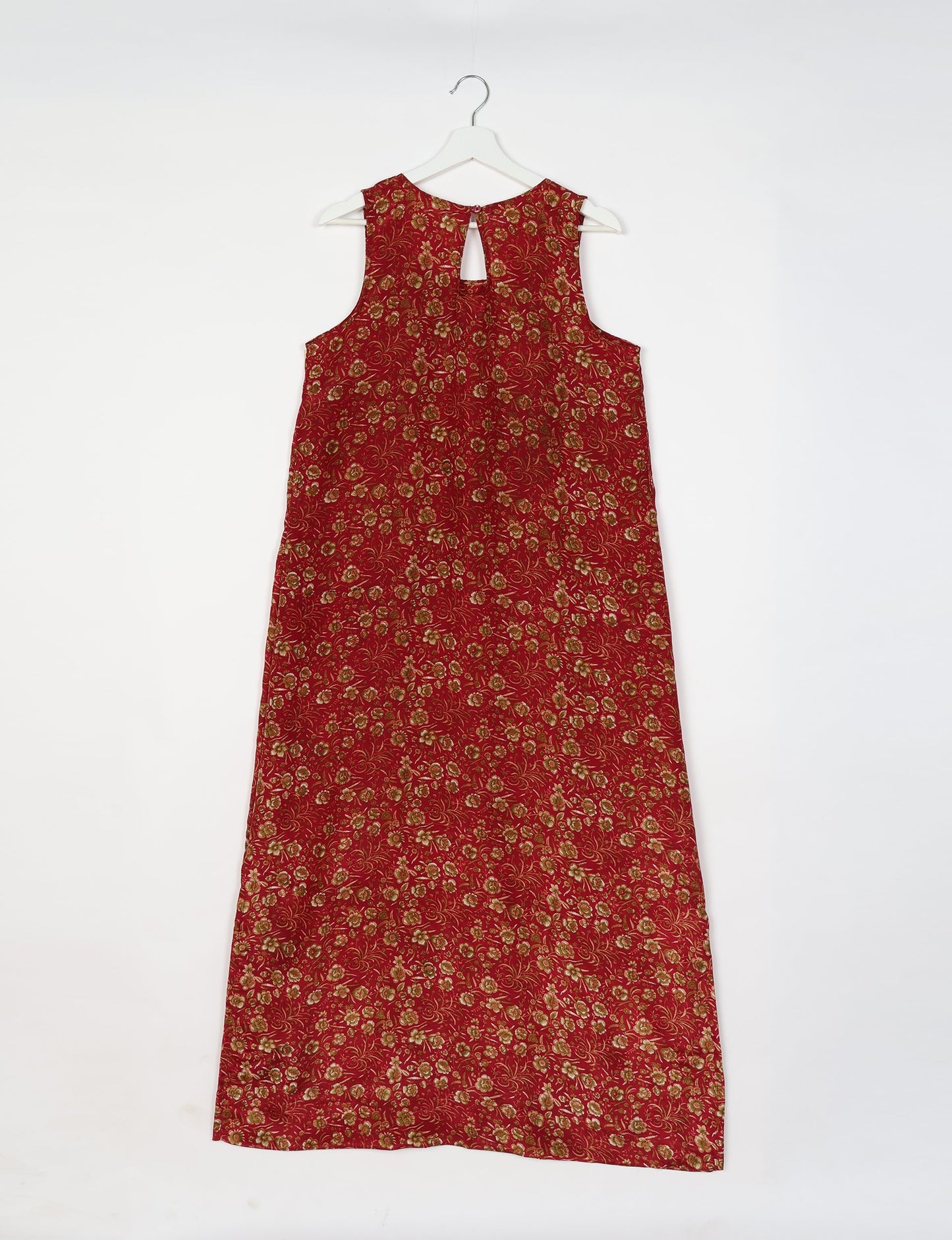 Sleeveless A-Line maxi dress made from recycled saris, showcasing eco clothing and green fashion. A chic example of upcycled women's clothing and climate neutral clothing, perfect for fans of circular fashion, carbon neutral fashion, and products made from textile waste.
