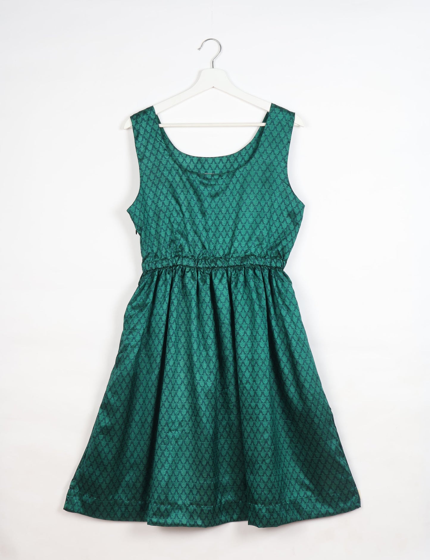 Upcycled women’s fit and flare dress made from recycled sari products, showcasing environment friendly clothing and green fashion design — an eco clothing choice for conscious clothing lovers and sustainable women’s fashion enthusiasts.