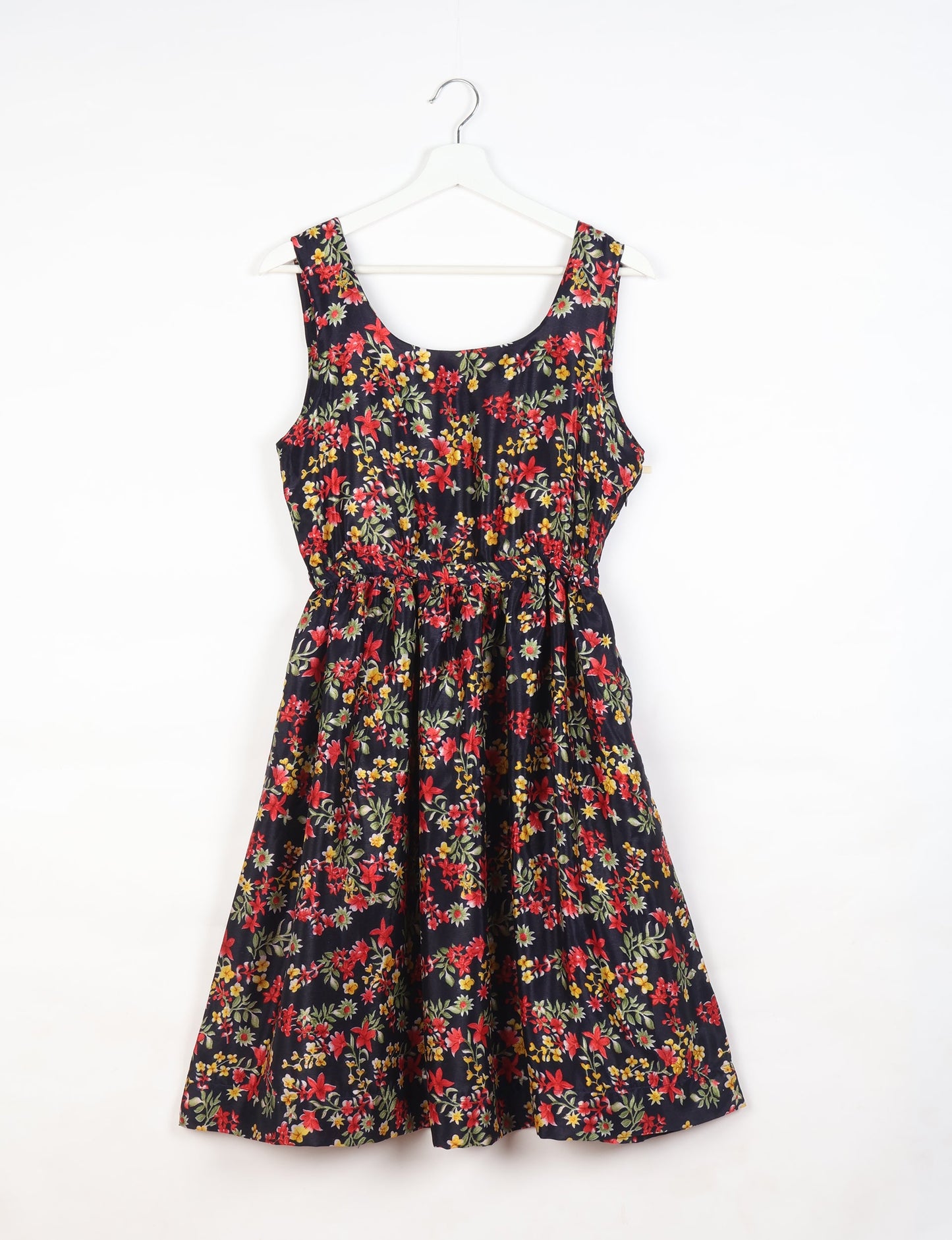 Upcycled women’s fit and flare dress made from recycled sari products, showcasing environment friendly clothing and green fashion design — an eco clothing choice for conscious clothing lovers and sustainable women’s fashion enthusiasts.