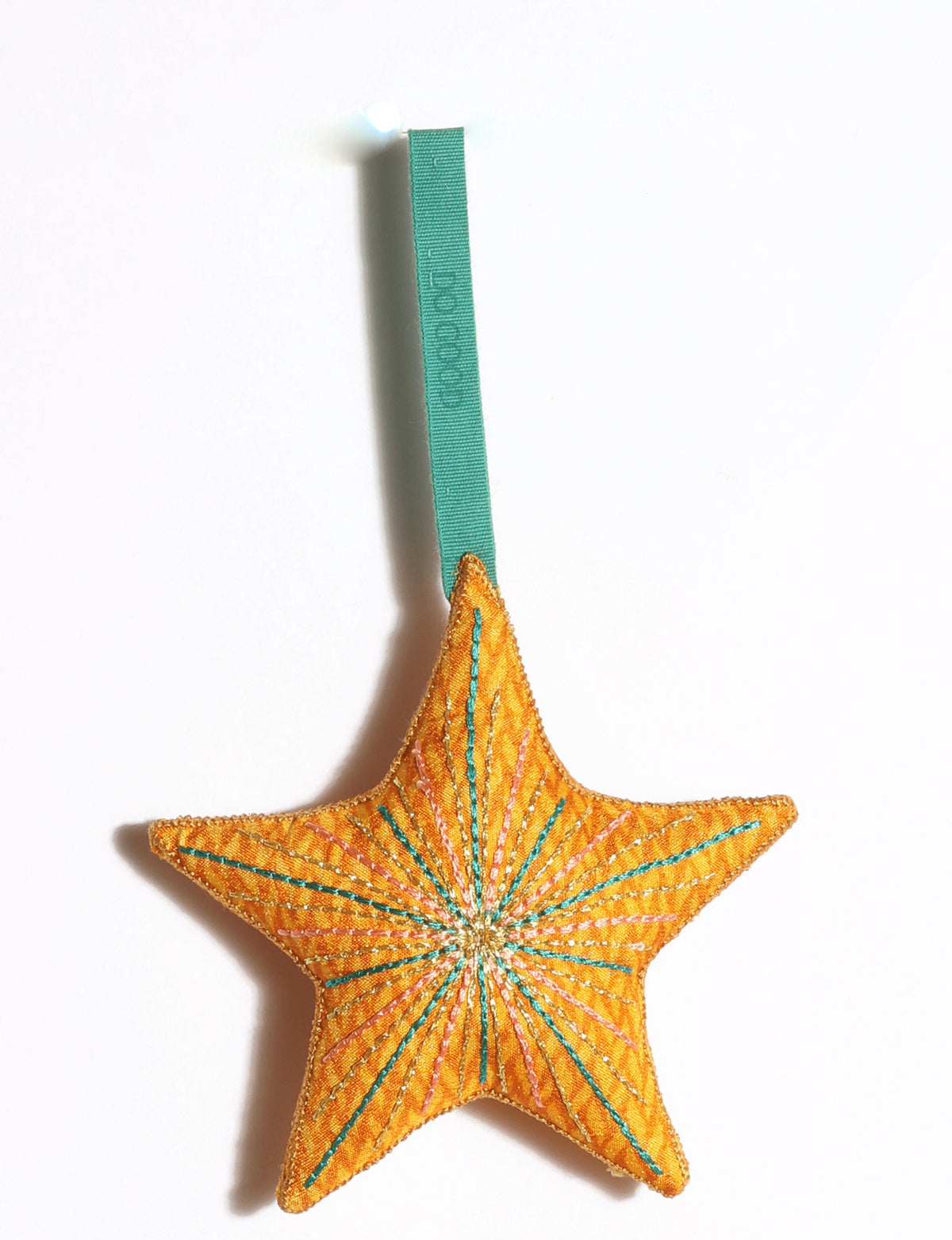 Handmade star ornament made from preloved saris with vibrant silk and gold thread embroidery and DO GOOD detailing.