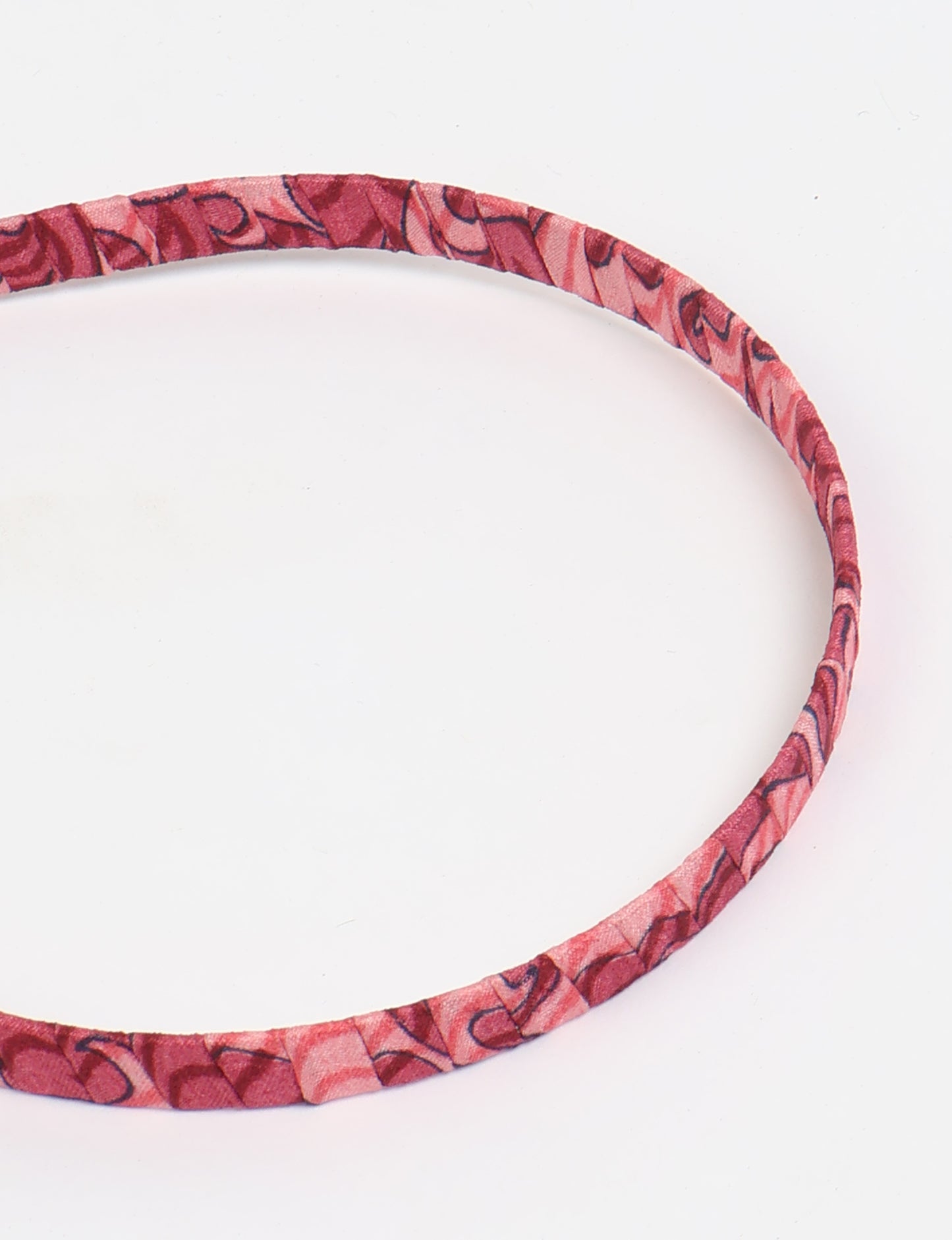 Thin fabric-wrapped metal hairband for a clean and stylish everyday look