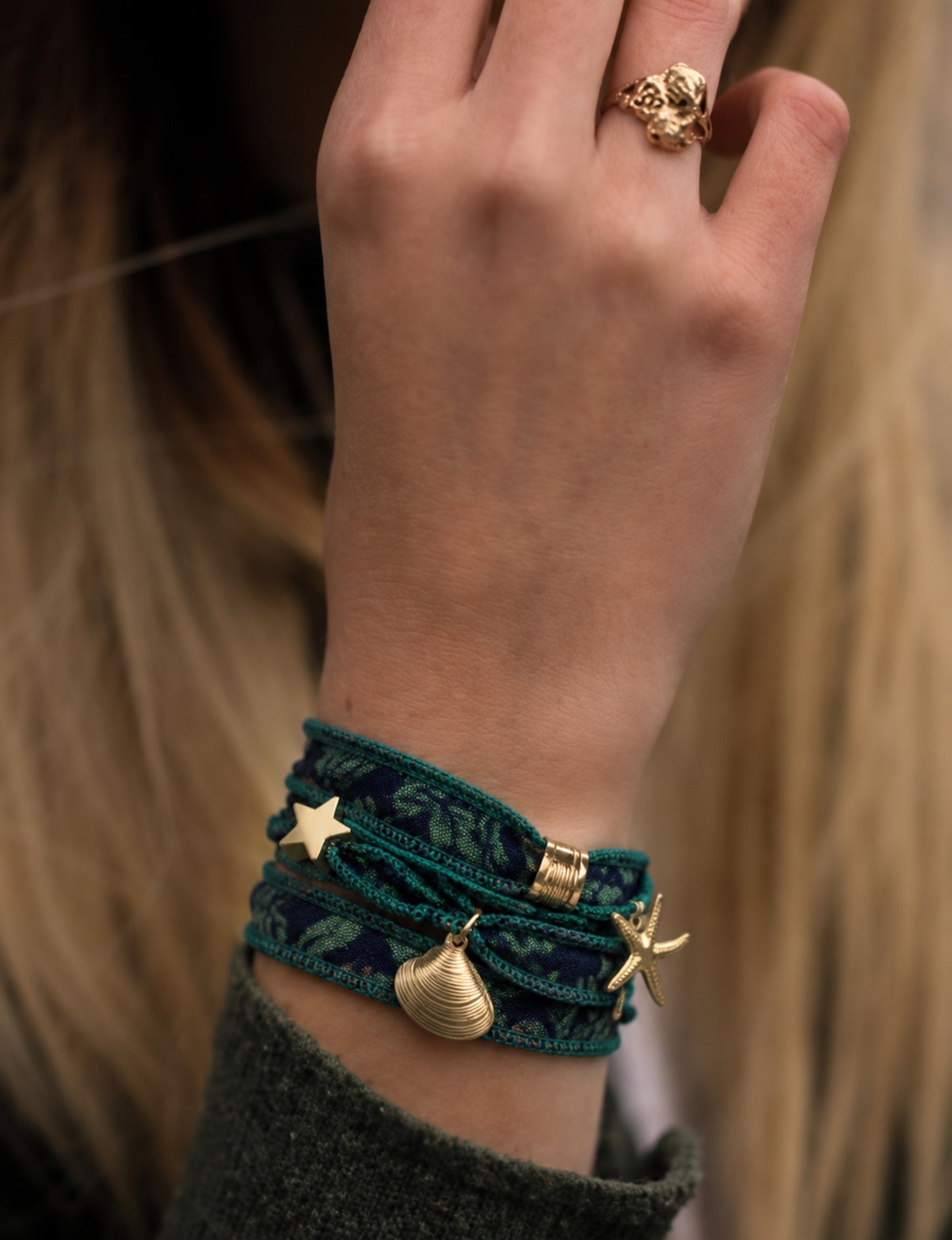 Wrap around bracelet with stainless steel 18K gold-plated charms, adjustable layered bracelet for everyday wear.