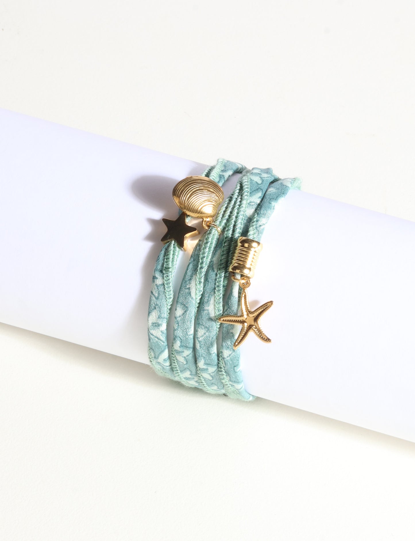 Wrap around bracelet with stainless steel 18K gold-plated charms, adjustable layered bracelet for everyday wear.
