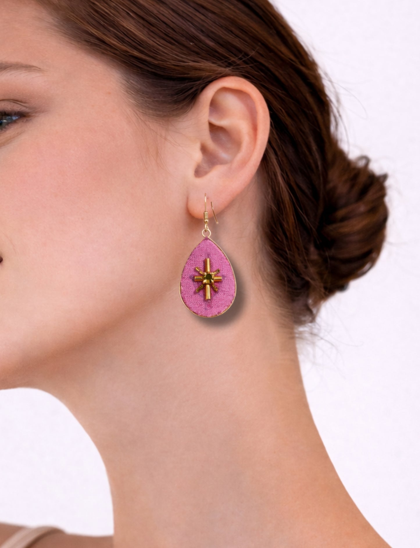 Teardrop embroidery drop earrings inspired by upcycled women’s clothing, sustainable women’s clothing, eco friendly clothes, recycled sustainable fashion, carbon neutral fashion, and environment friendly clothing principles.