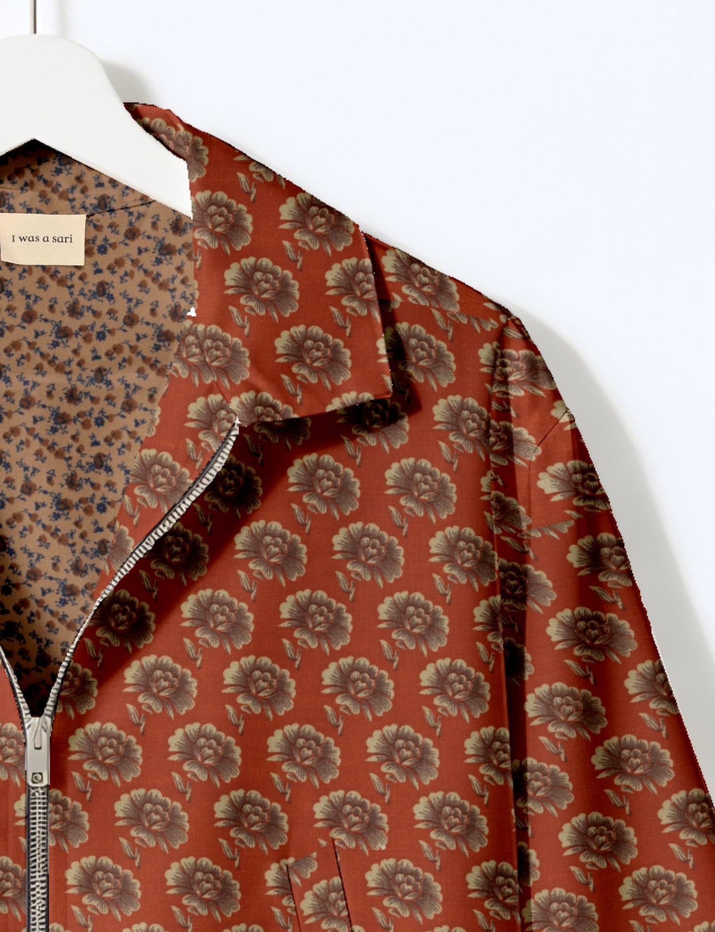 Upcycled Bomber Jacket made from recycled sari materials, featuring a cute cropped shape, elasticated hem and cuffs, and contrast sari print lining. Sustainable apparel promoting eco-friendly fashion and ethical clothing.