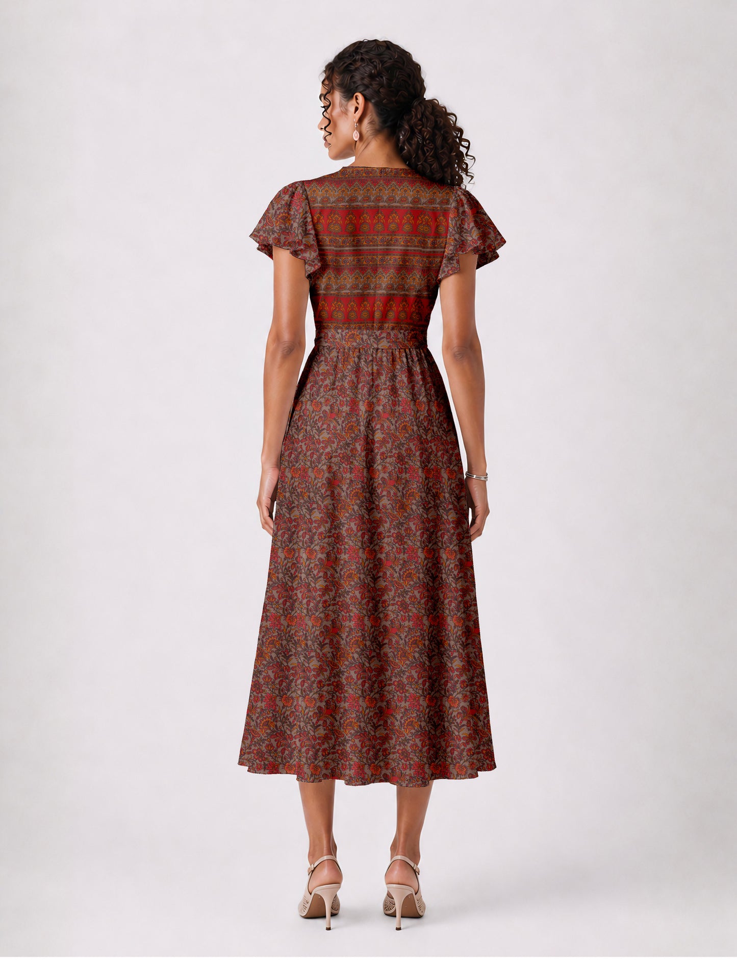 Elegant midi wrap dress with a V-neckline, adjustable waist tie, fitted bodice, and flared skirt for a timeless, flattering silhouette.