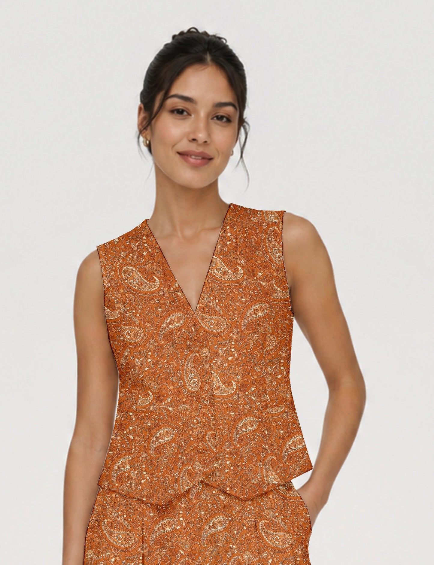 Women's fitted waistcoat with V-neck, single-breasted button closure, tailored silhouette, and pointed hem in sustainable fashion.
