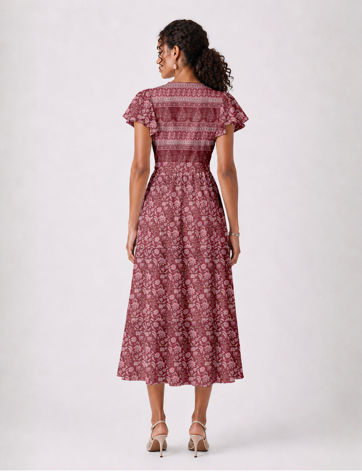 Elegant midi wrap dress with a V-neckline, adjustable waist tie, fitted bodice, and flared skirt for a timeless, flattering silhouette.