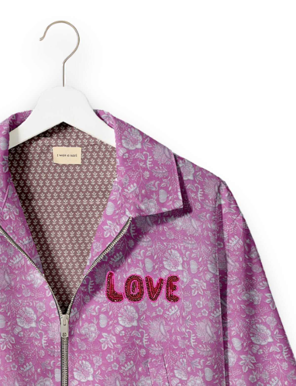 Love Bomber Jacket made from recycled fabric, featuring hand-stitched Aari embroidery. A unique piece of zero-waste clothing, part of the circular fashion movement. Designed with upcycled materials for a stylish yet environmentally friendly clothing choice.