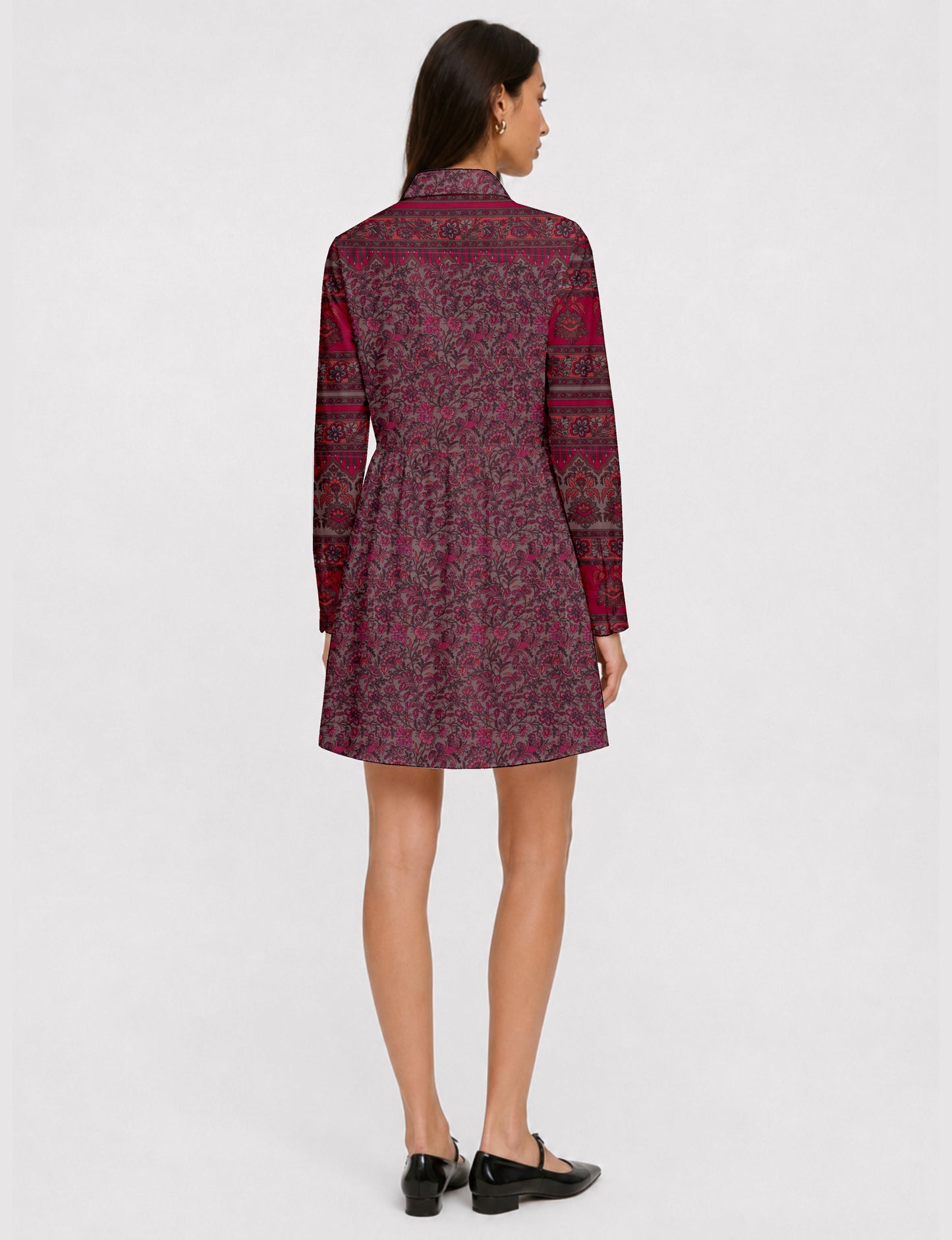 Short shirt dress with a relaxed A-line silhouette, point collar, partial button placket, gathered waist, side pockets, and full-length cuffed sleeves.