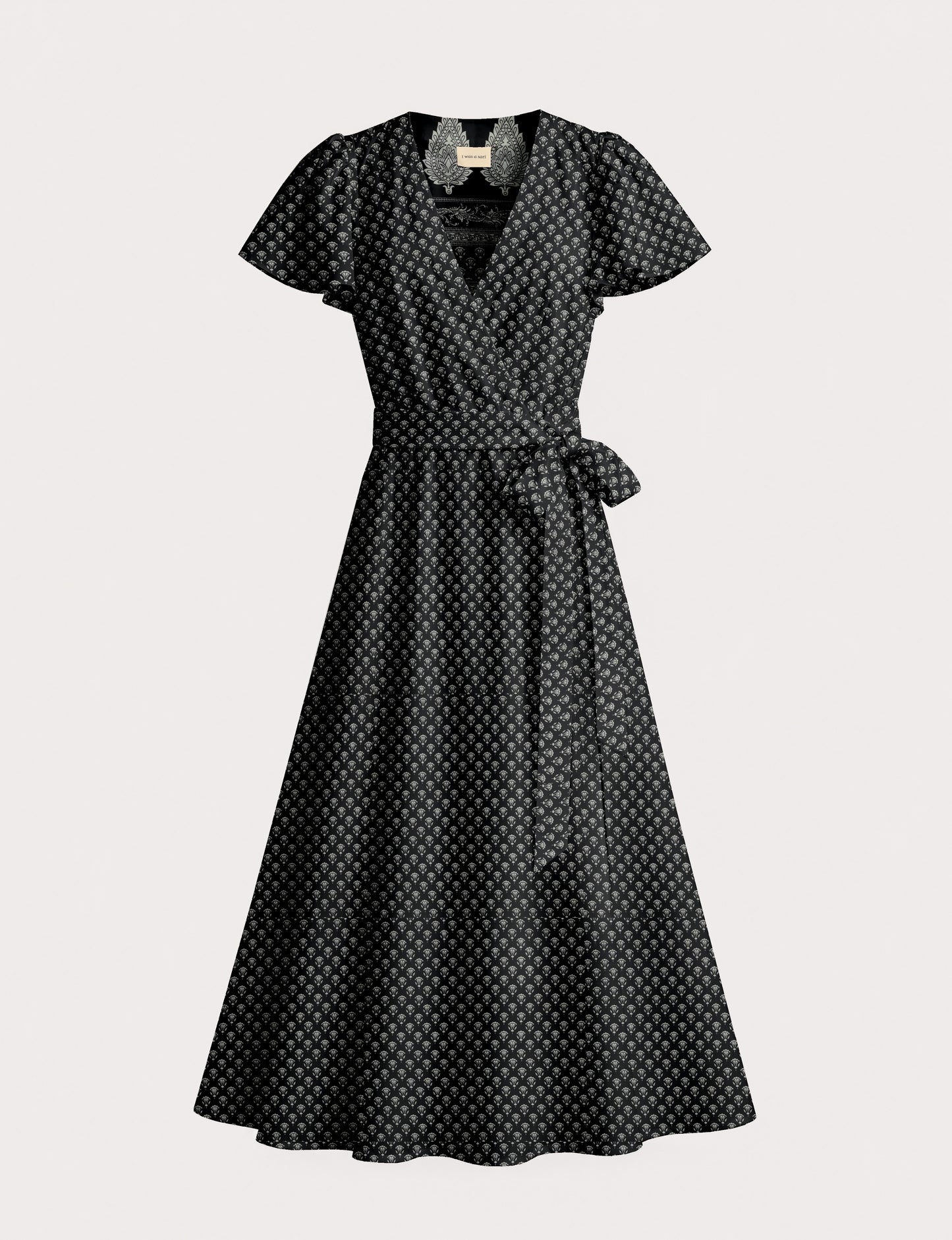 Midi wrap dress with V-neckline, fitted bodice, tie waist, and flared mid-calf skirt