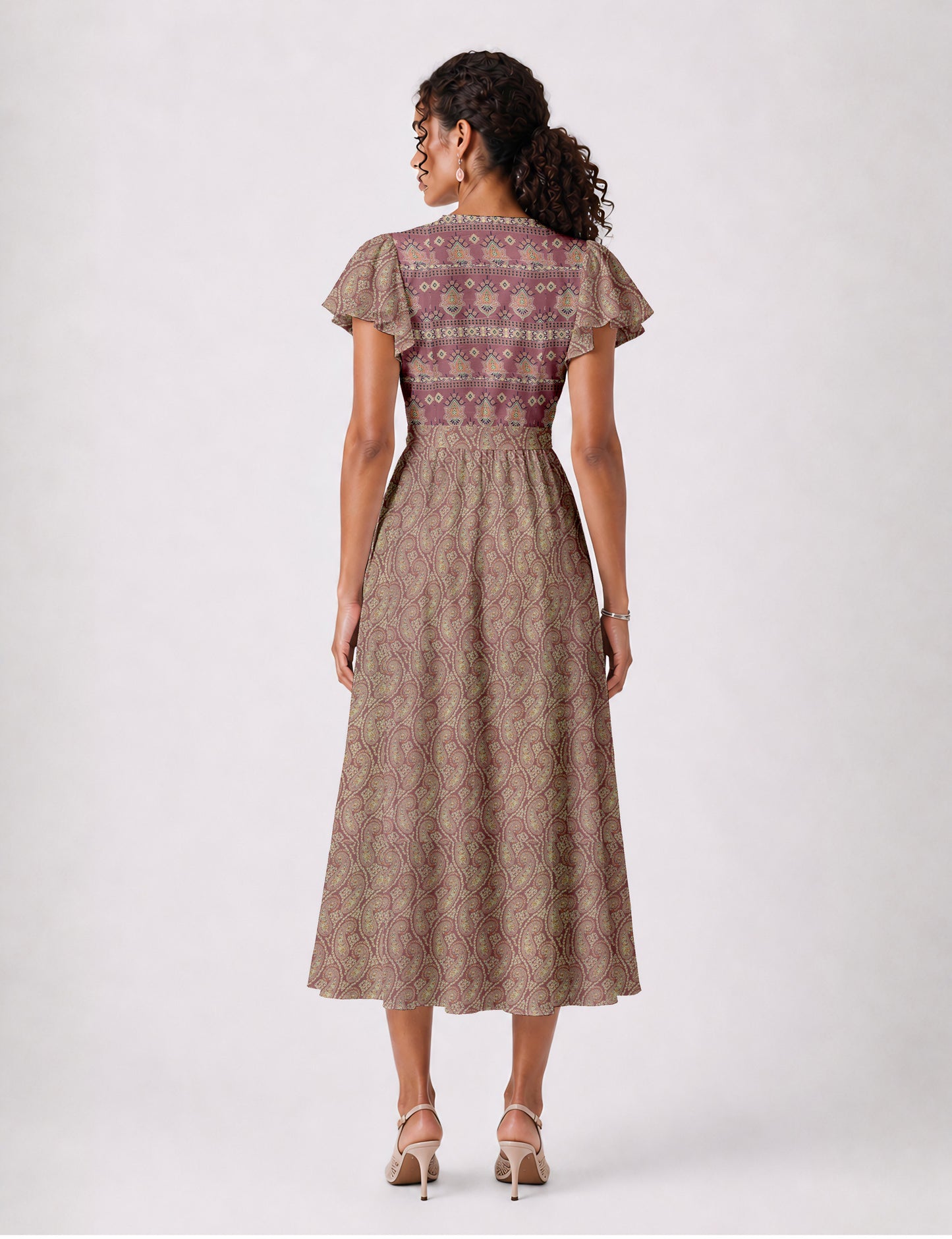 Elegant midi wrap dress with a V-neckline, adjustable waist tie, fitted bodice, and flared skirt for a timeless, flattering silhouette.