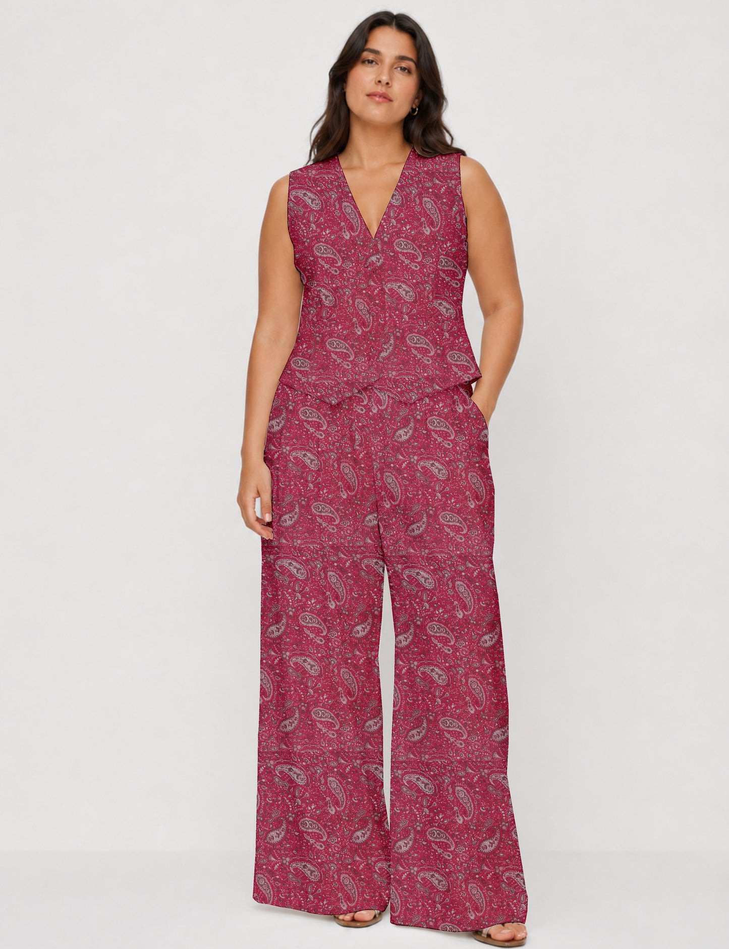 Women's tailored waistcoat set with a sleeveless V-neck button-front waistcoat and high-rise wide leg trousers in a coordinated matching outfit.