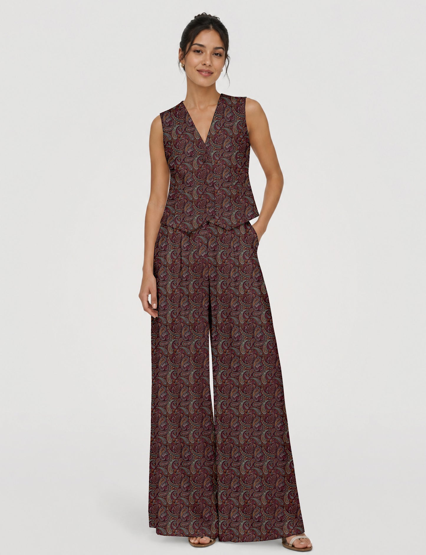 Women's tailored waistcoat set with a sleeveless V-neck button-front waistcoat and high-rise wide leg trousers in a coordinated matching outfit.