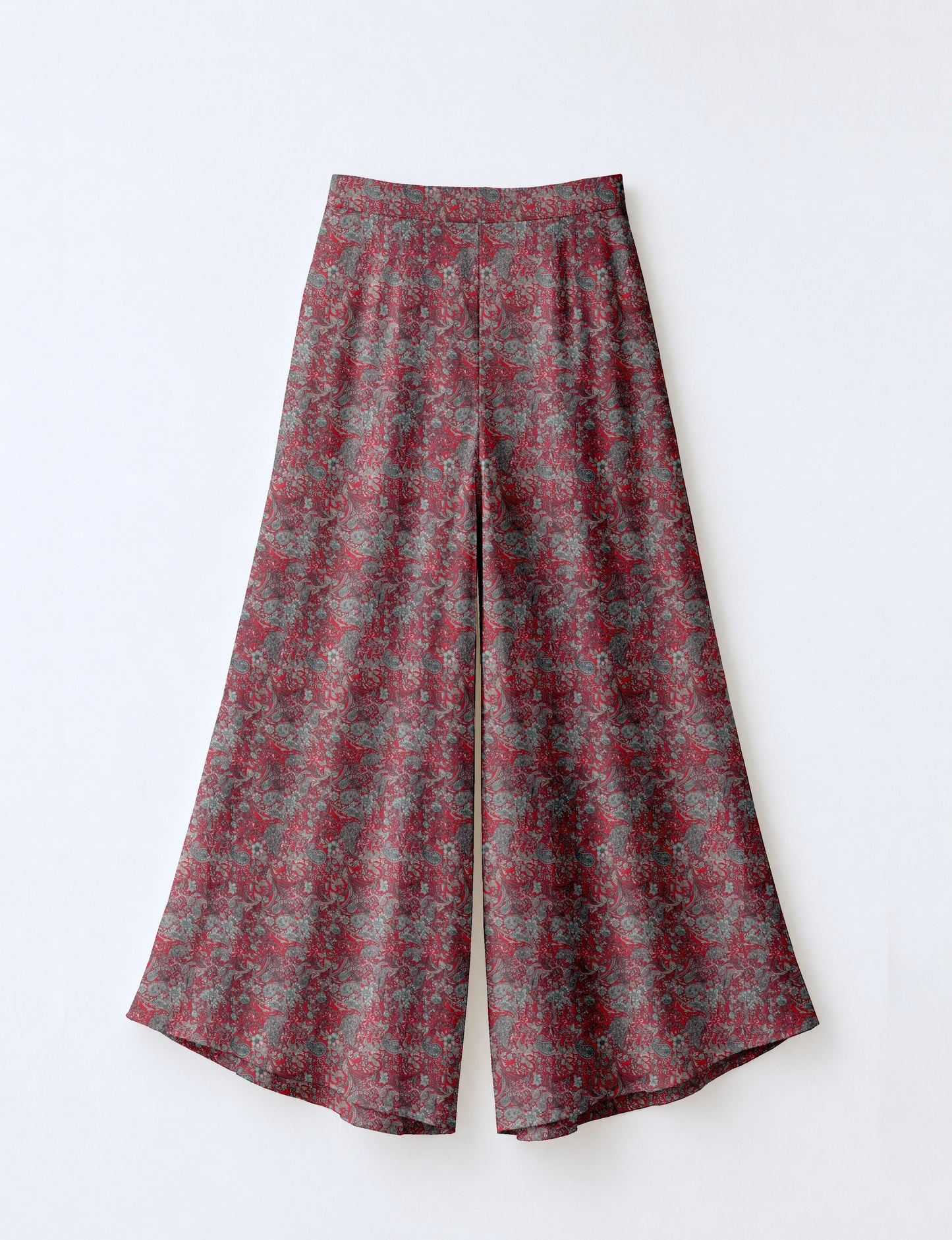 Women's wide leg palazzo trousers with a fitted waistband and relaxed flowing silhouette.