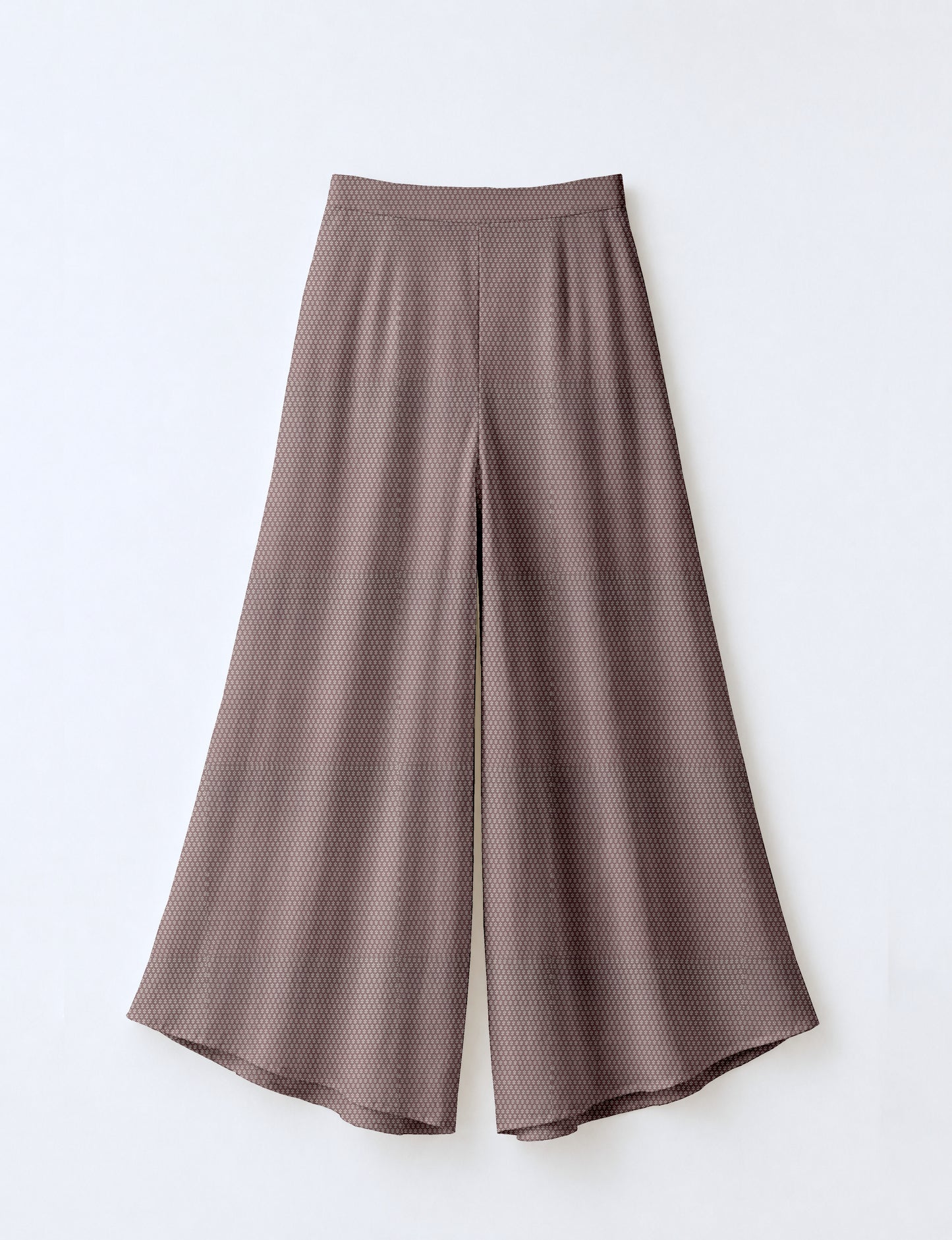 Women's wide leg palazzo trousers with a fitted waistband and relaxed flowing silhouette.