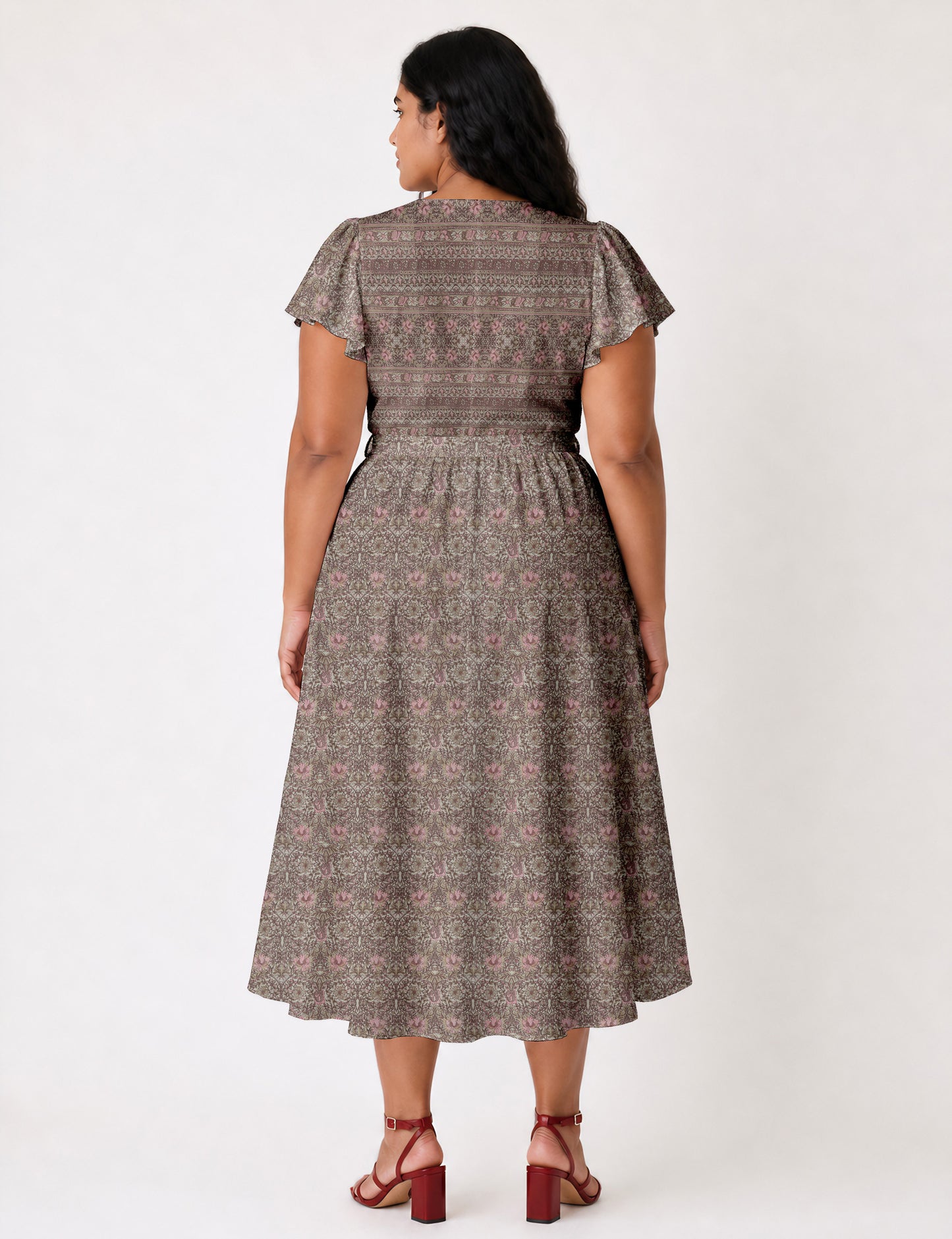 Elegant midi wrap dress with a V-neckline, adjustable waist tie, fitted bodice, and flared skirt for a timeless, flattering silhouette.