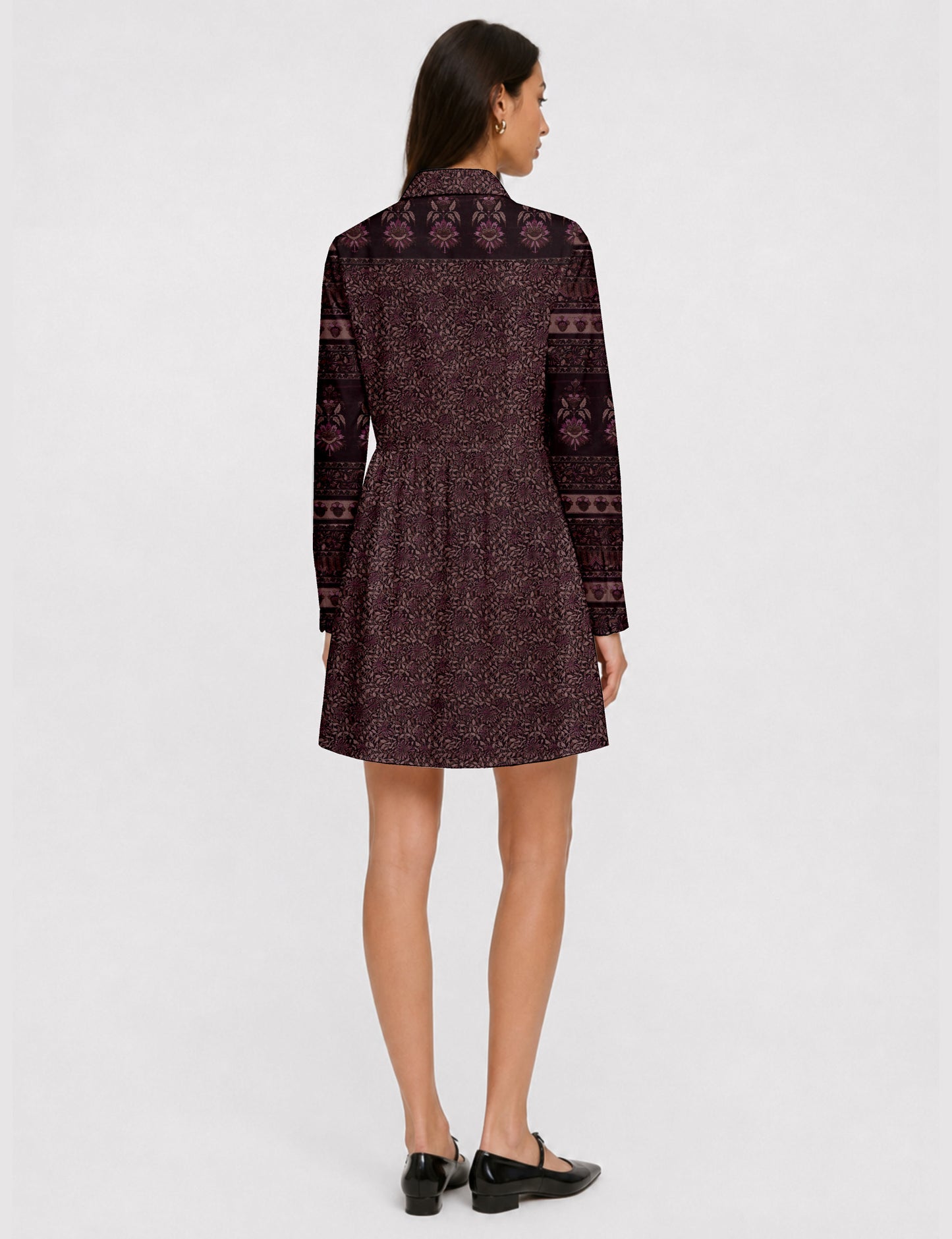 Short shirt dress with a relaxed A-line silhouette, point collar, partial button placket, gathered waist, side pockets, and full-length cuffed sleeves.