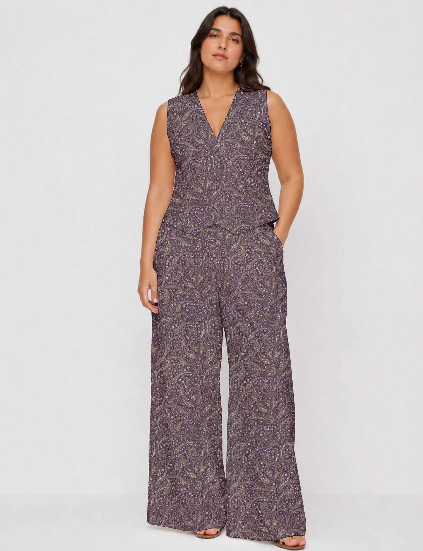 Women's tailored waistcoat set with a sleeveless V-neck button-front waistcoat and high-rise wide leg trousers in a coordinated matching outfit.