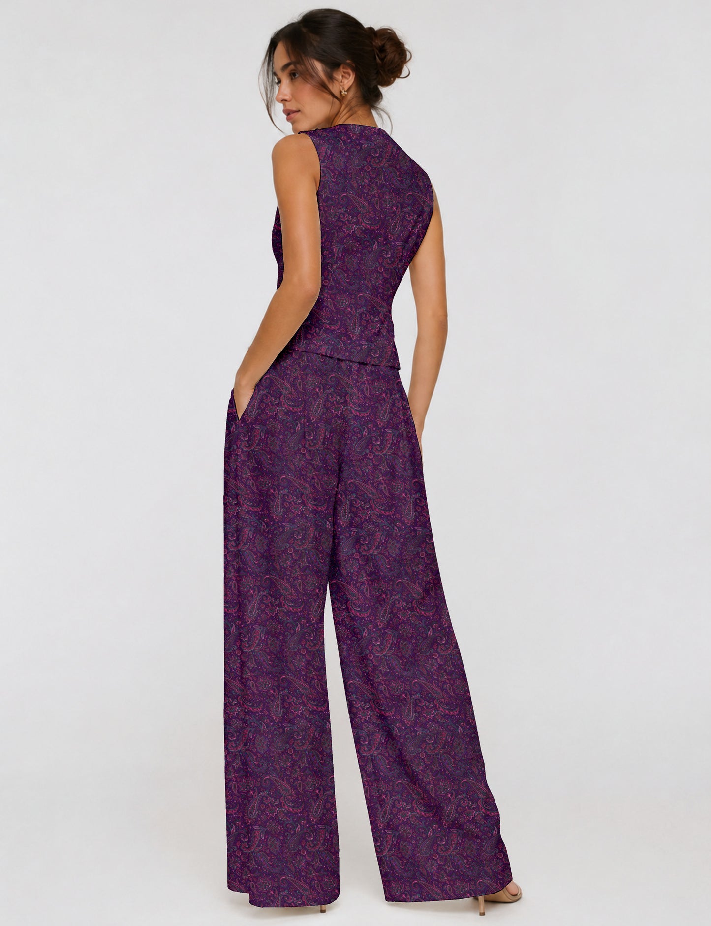 Women's tailored waistcoat set with a sleeveless V-neck button-front waistcoat and high-rise wide leg trousers in a coordinated matching outfit.