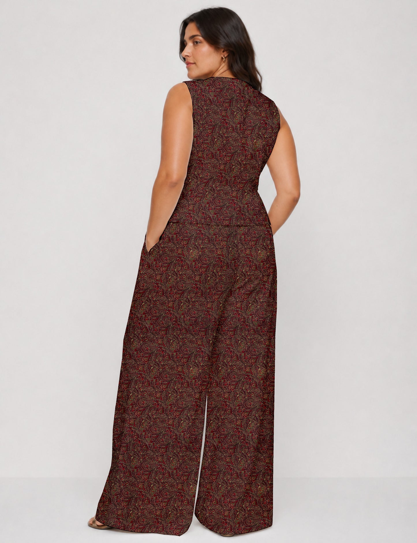 Women's tailored waistcoat set with a sleeveless V-neck button-front waistcoat and high-rise wide leg trousers in a coordinated matching outfit.
