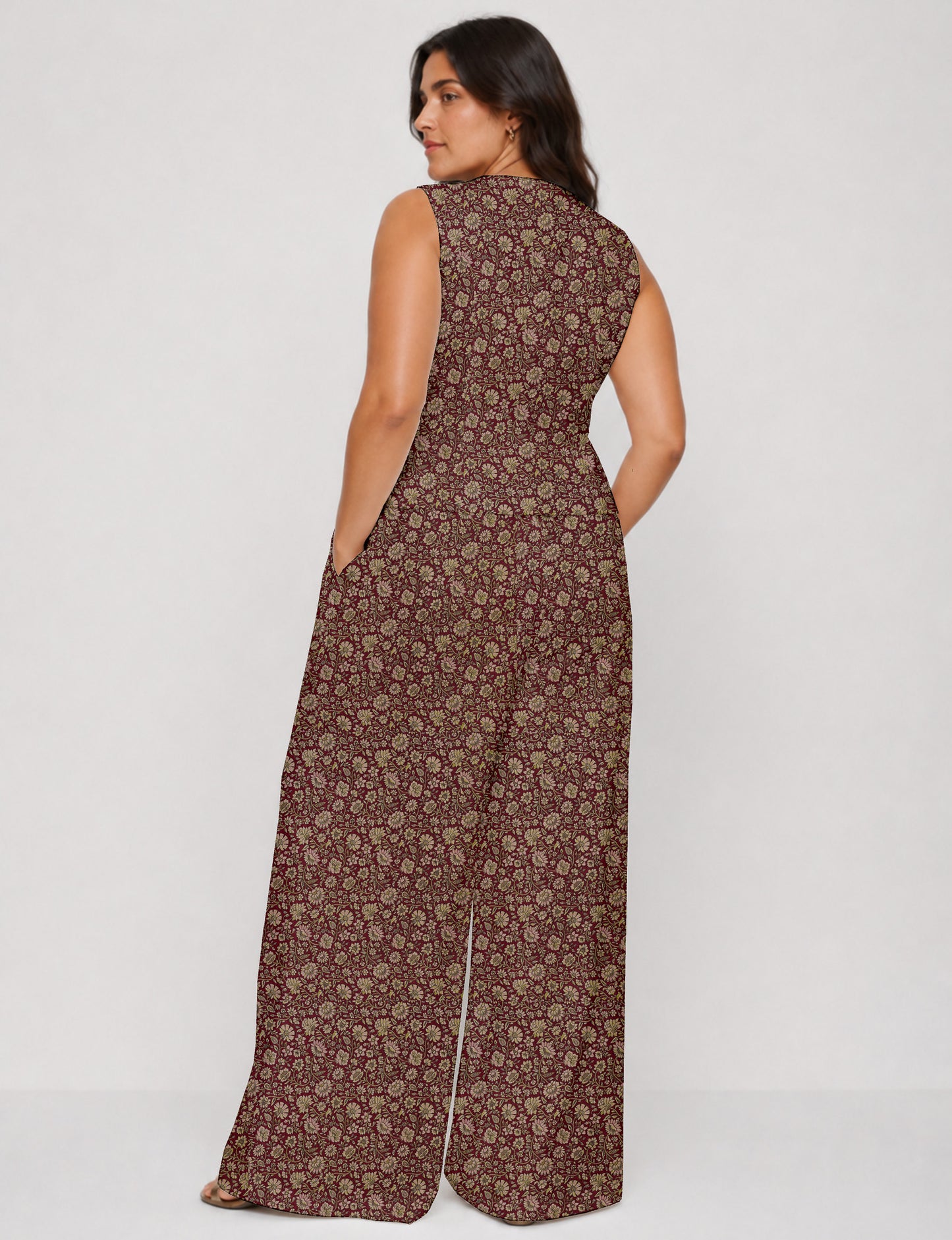 Women's tailored waistcoat set with a sleeveless V-neck button-front waistcoat and high-rise wide leg trousers in a coordinated matching outfit.