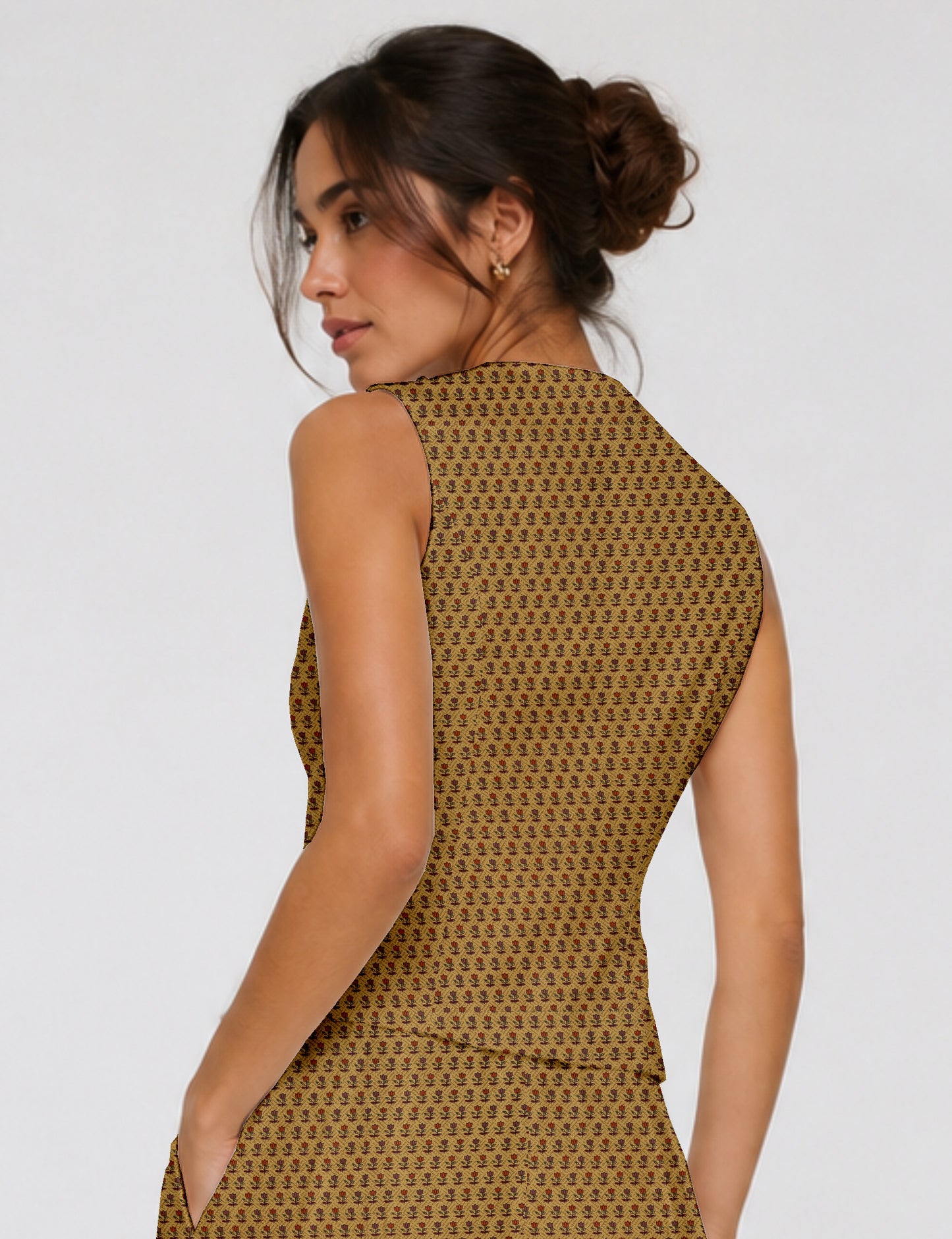 Women's fitted waistcoat with V-neck, single-breasted button closure, tailored silhouette, and pointed hem in sustainable fashion.