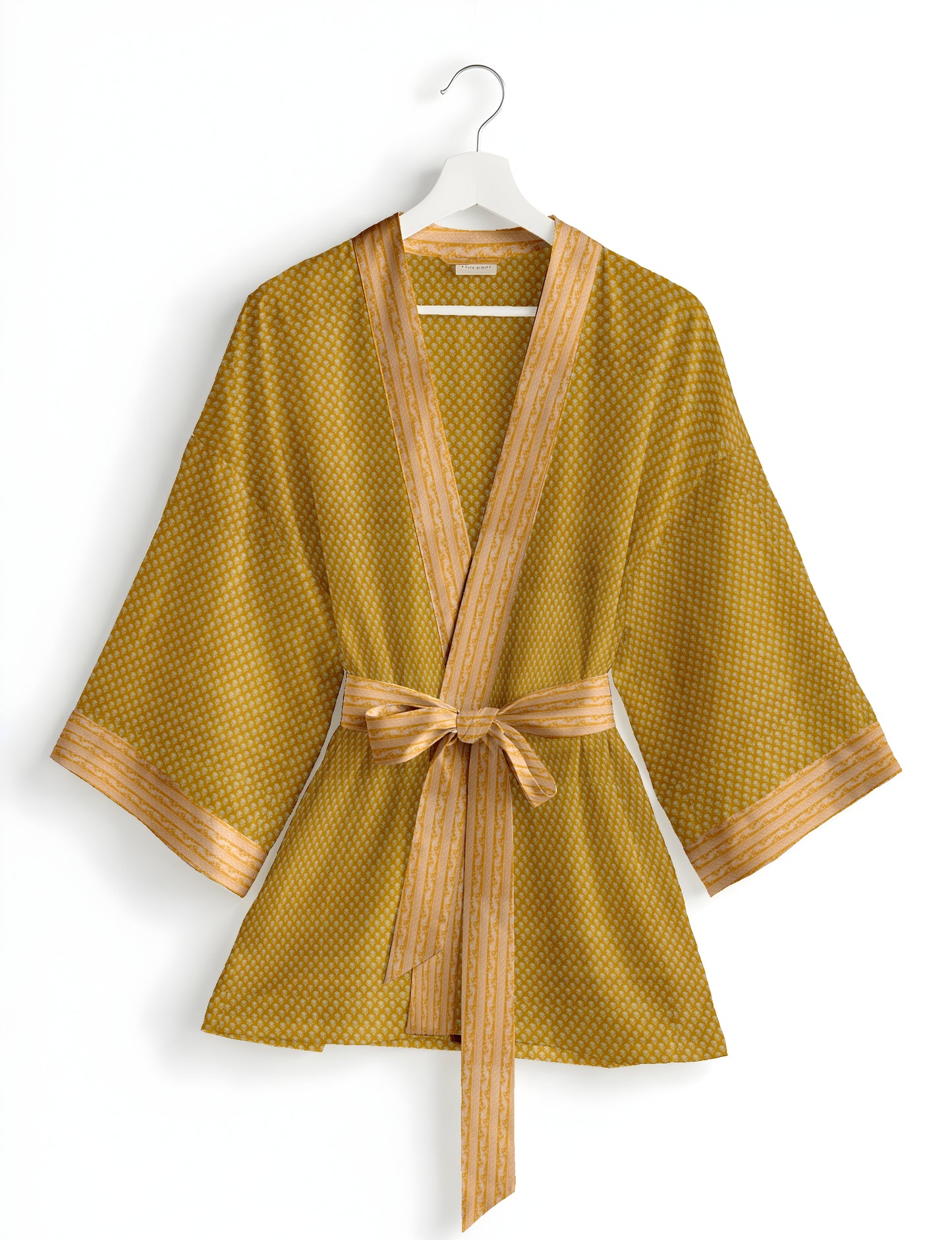 Short kimono robe with wrap front, V-neckline, wide sleeves, waist tie, and concealed skort detail.