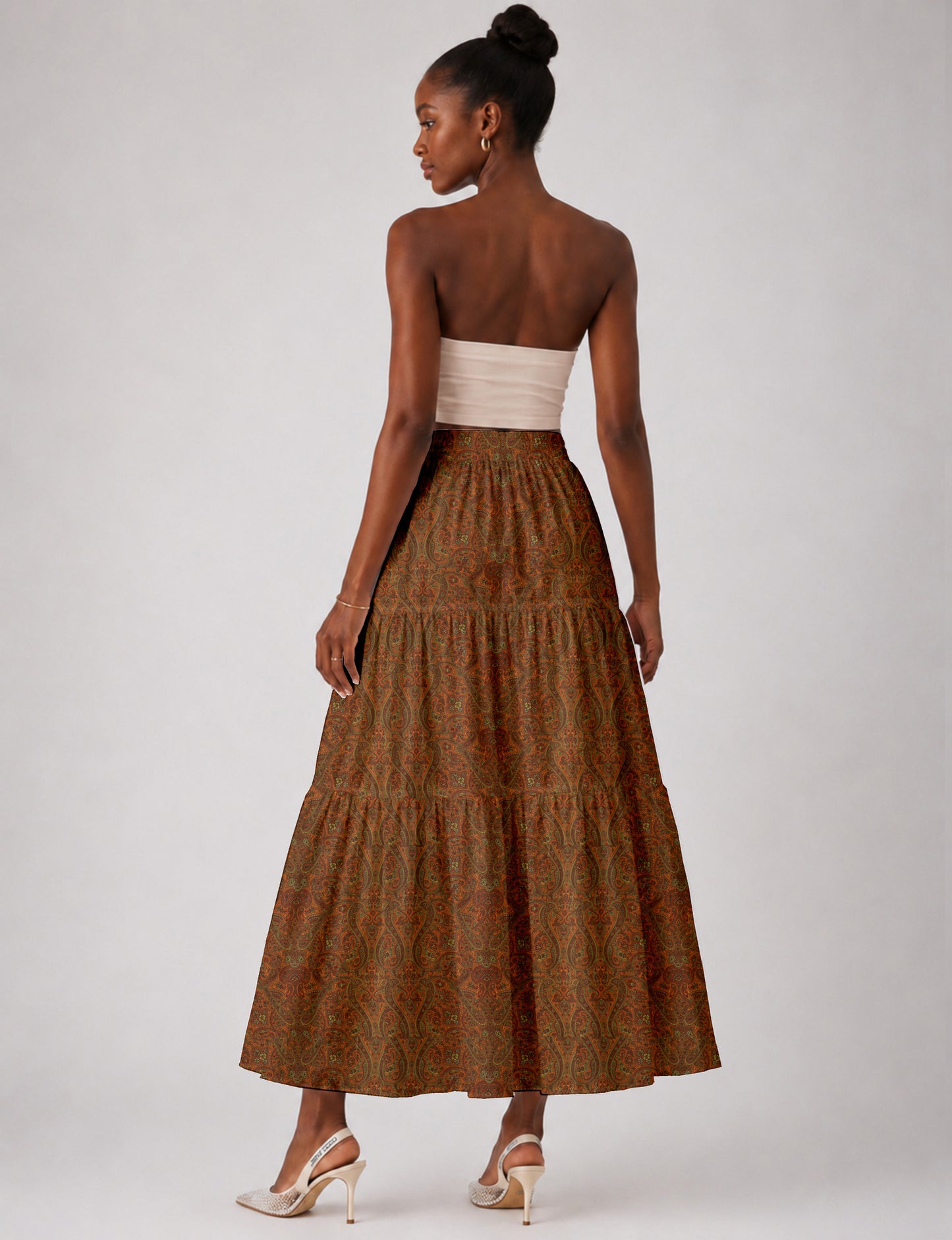 Yellow midi tiered skirt with small dark geometric micro pattern, flat lay front view