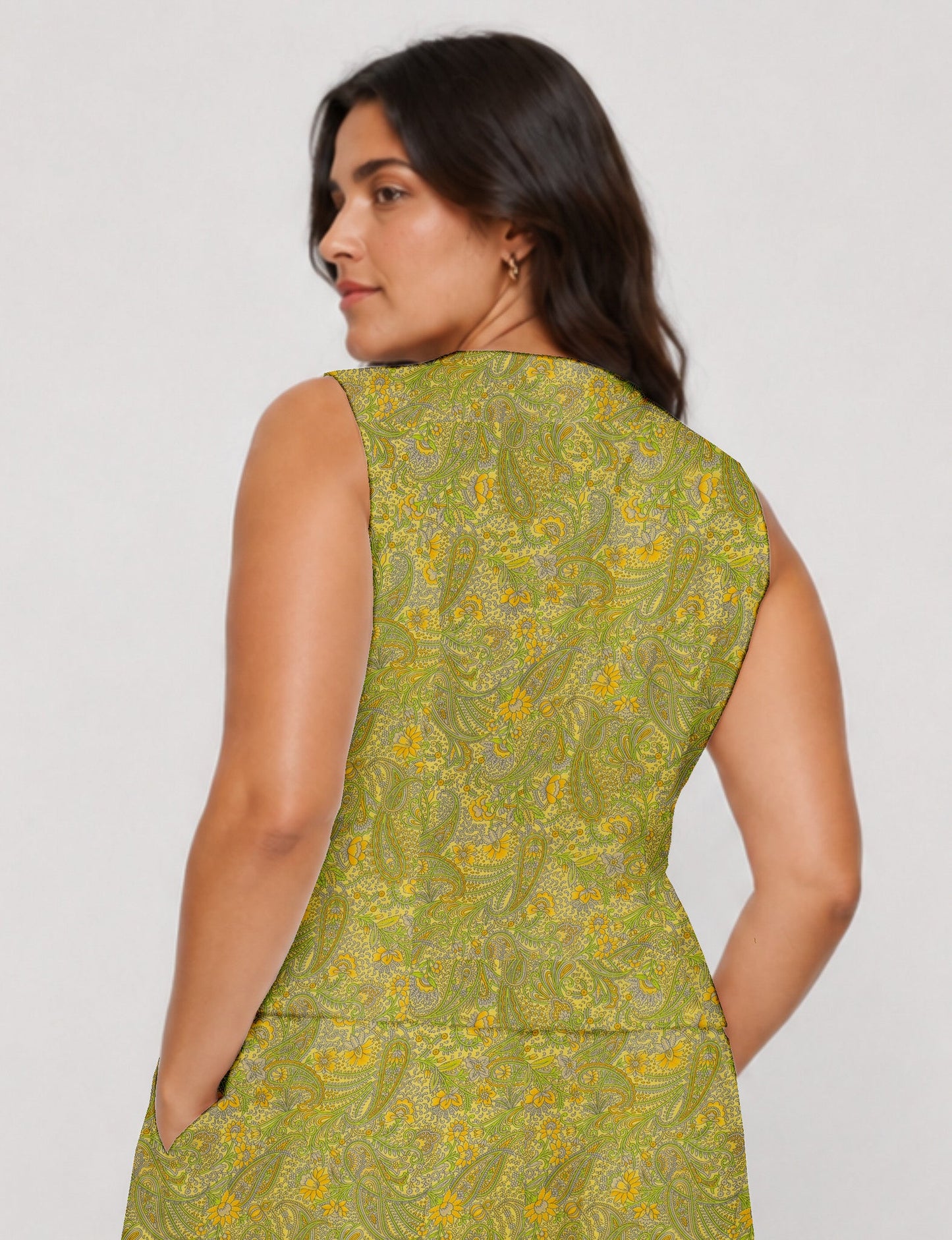 Women's fitted waistcoat with V-neck, single-breasted button closure, tailored silhouette, and pointed hem in sustainable fashion.
