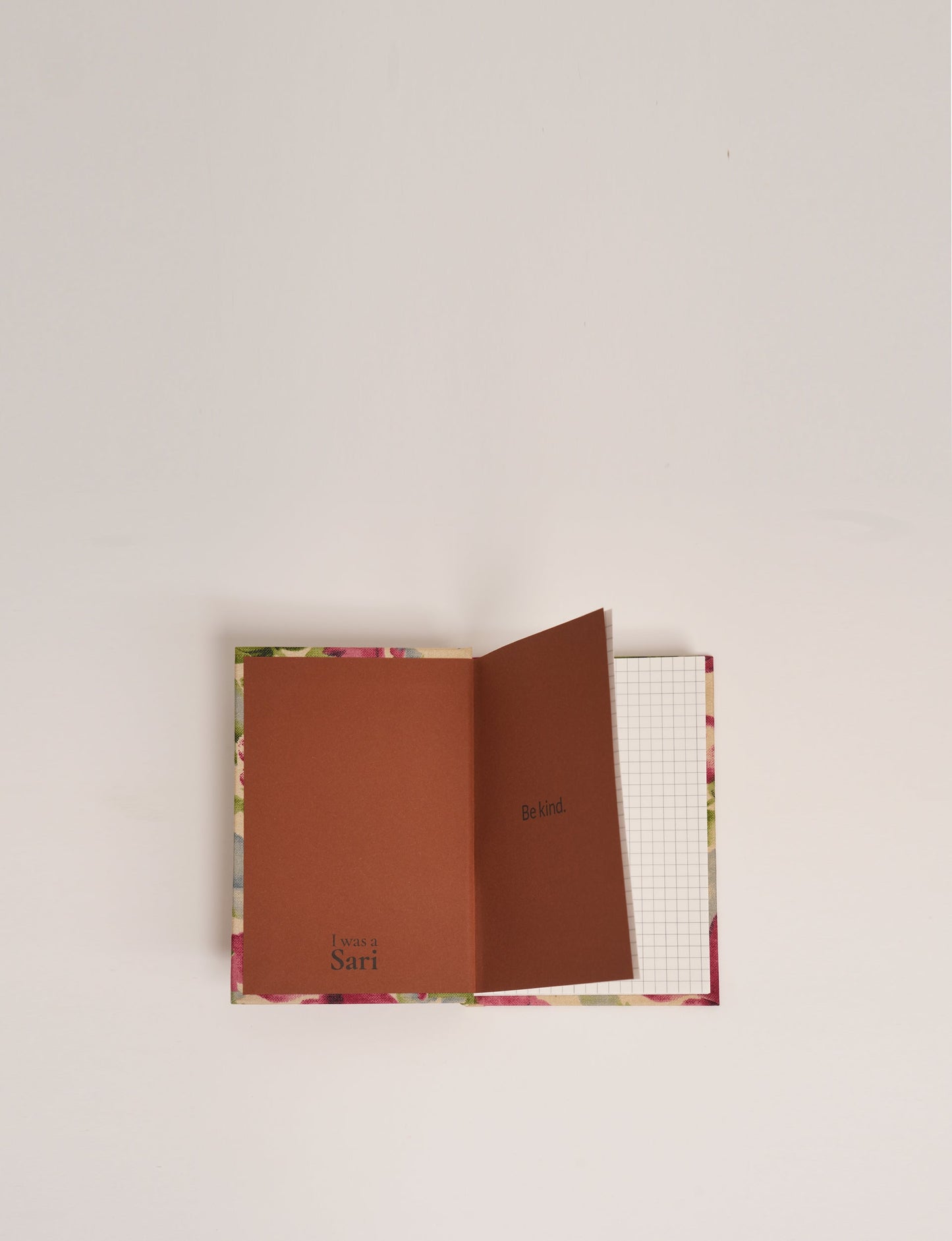 Indulge your creative spirit with our A6 hardcover notebook – a blend of sustainability and style. Made with 100% recycled paper and adorned with pre-loved sari fabric, this eco-conscious notebook encourages mindful note-taking and resonates with the principles of eco-friendly fashion.
