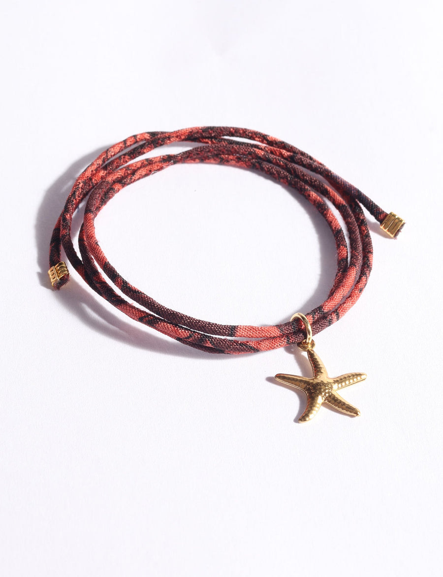 Cord bracelet with charm star fish