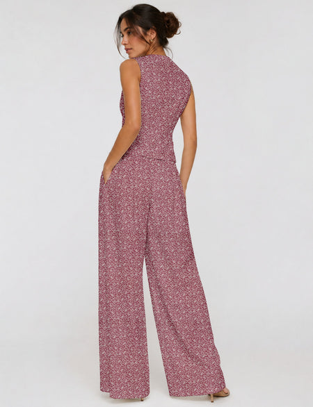 Women's tailored waistcoat set with a sleeveless V-neck button-front waistcoat and high-rise wide leg trousers in a coordinated matching outfit.
