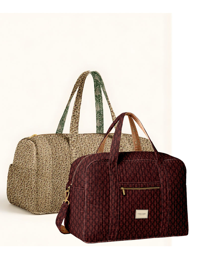Twin travel bag set with duffle and barrel bags in beige and maroon micro floral patterns, front and side views