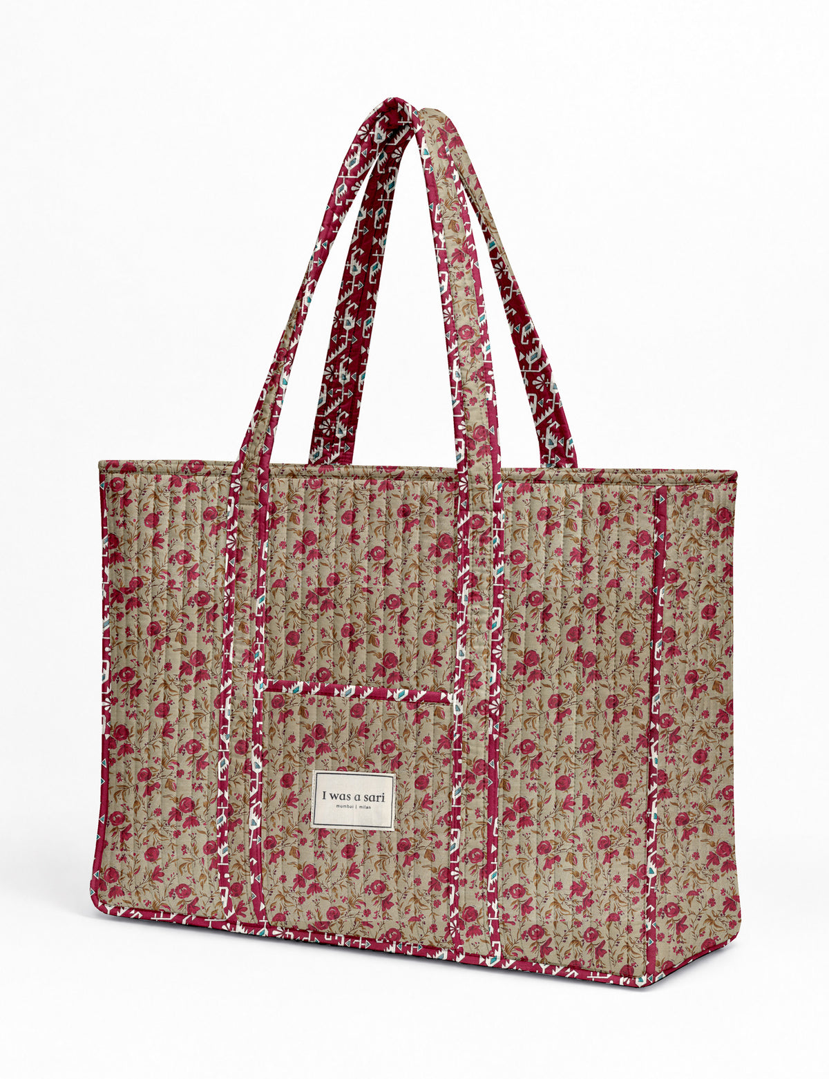 Quilted work tote bag with structured rectangular design and long shoulder straps, representing slow fashion and ethical clothing ideals, made as part of upcycled women's clothing and sustainable women's clothing using recycled fashion and earth friendly clothing practices.