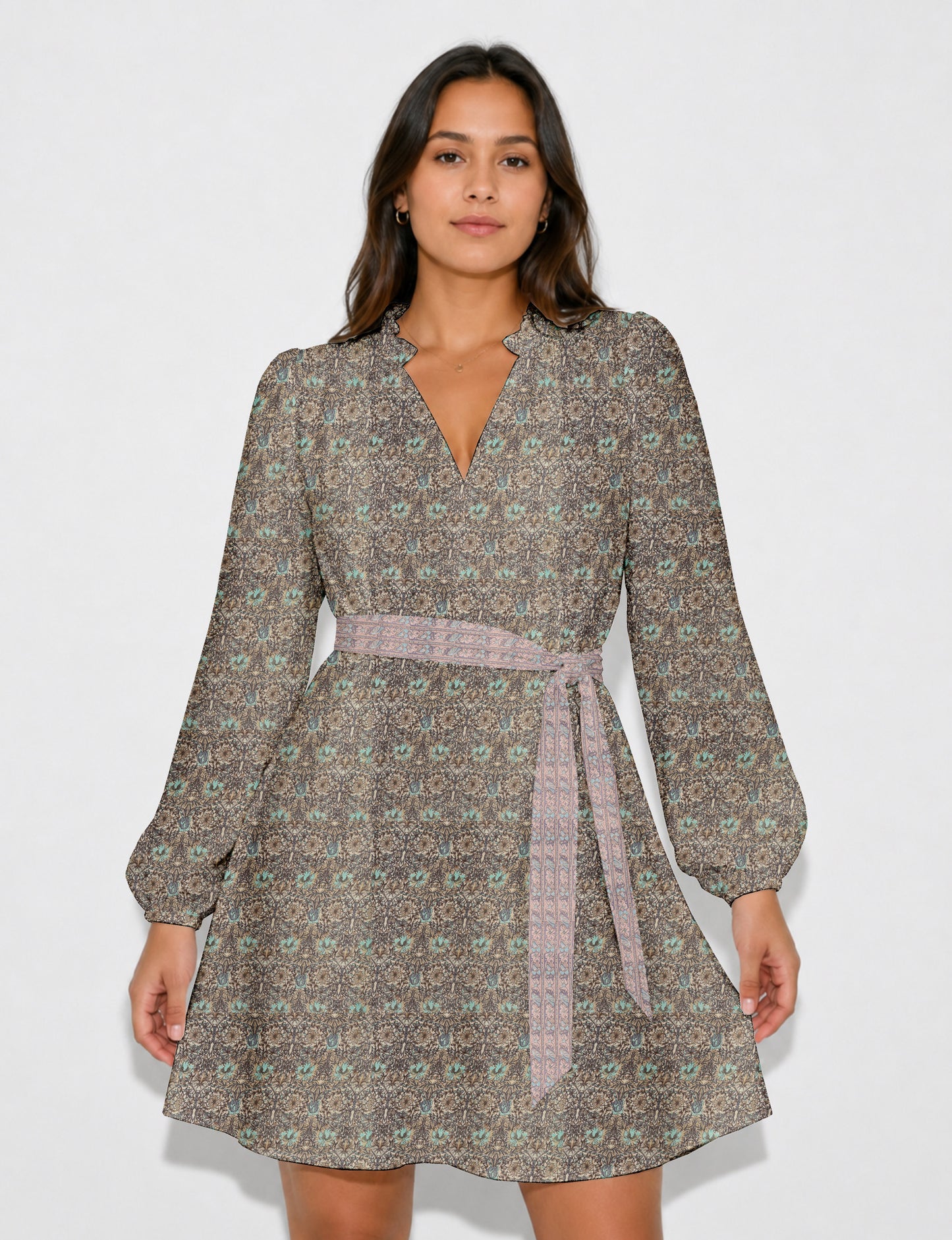 Swing dress with detachable tie belt, gathered ruffle neckline, full-length voluminous sleeves, elastic cuffs, and relaxed A-line silhouette in an above-knee length.