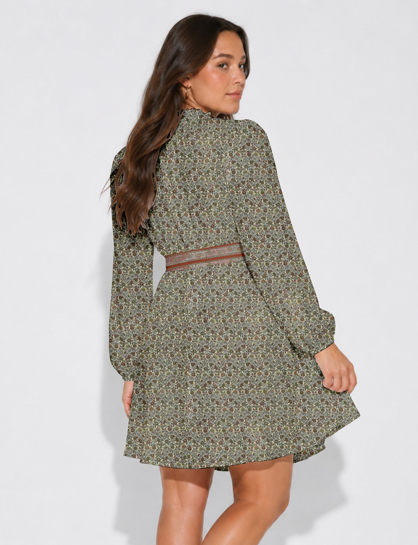 Swing dress with detachable tie belt, gathered ruffle neckline, full-length voluminous sleeves, elastic cuffs, and relaxed A-line silhouette in an above-knee length.