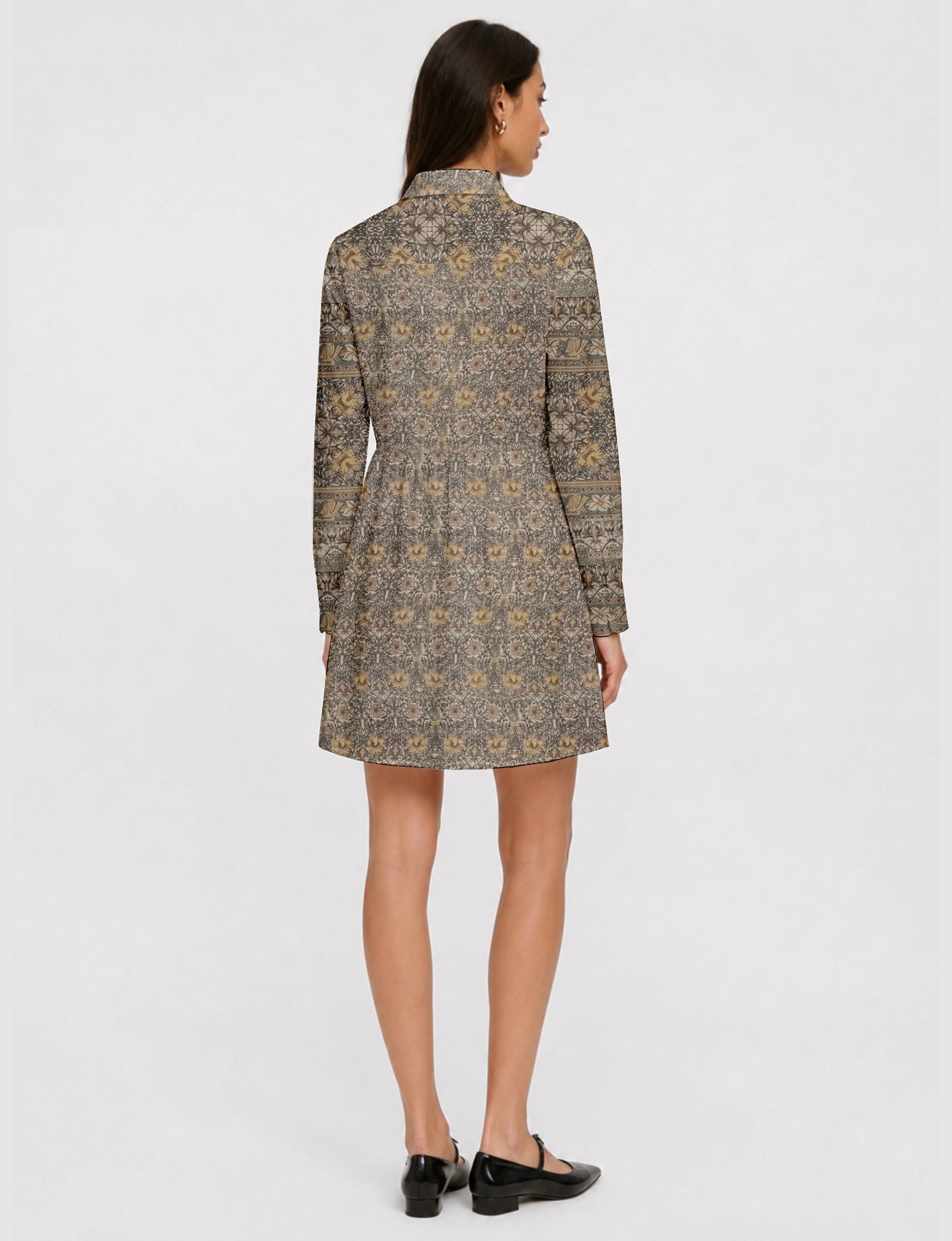Short shirt dress with a relaxed A-line silhouette, point collar, partial button placket, gathered waist, side pockets, and full-length cuffed sleeves.