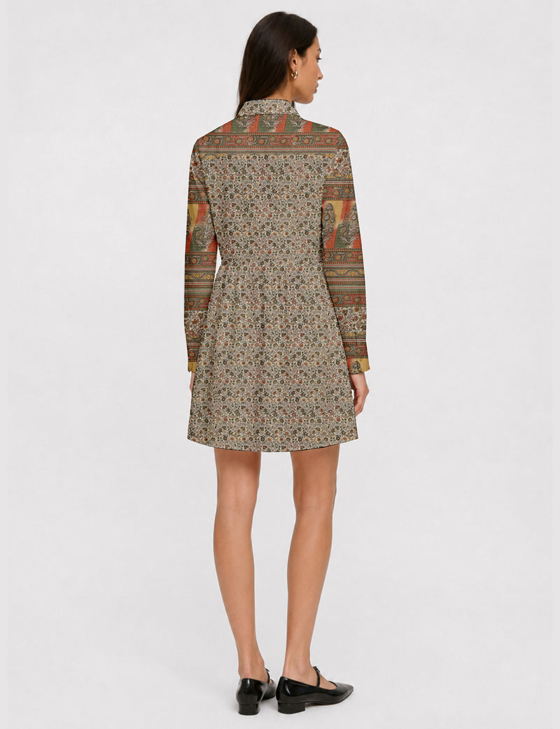 Short shirt dress with a relaxed A-line silhouette, point collar, partial button placket, gathered waist, side pockets, and full-length cuffed sleeves.