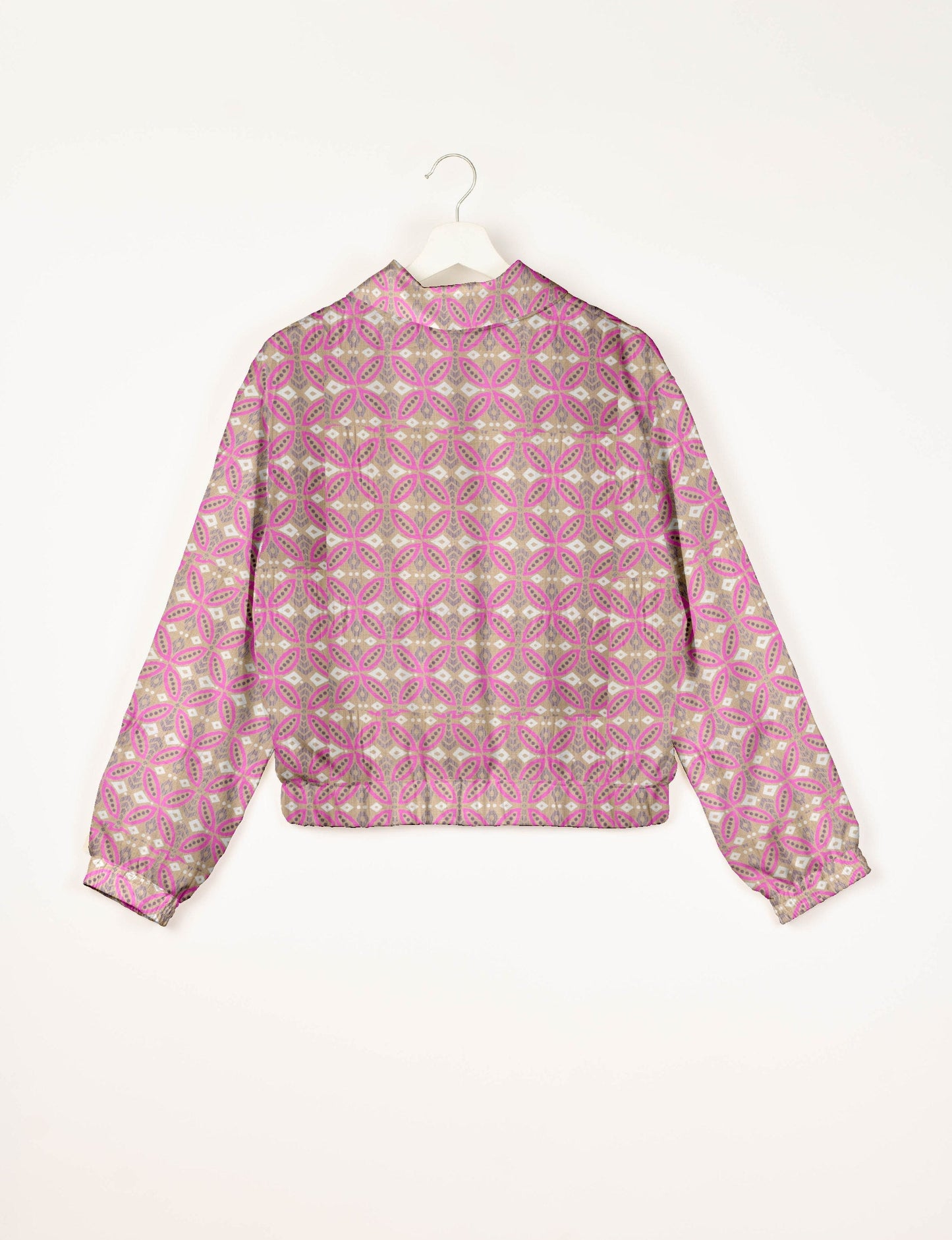 Upcycled Bomber Jacket made from recycled sari materials, featuring a cute cropped shape, elasticated hem and cuffs, and contrast sari print lining. Sustainable apparel promoting eco-friendly fashion and ethical clothing.