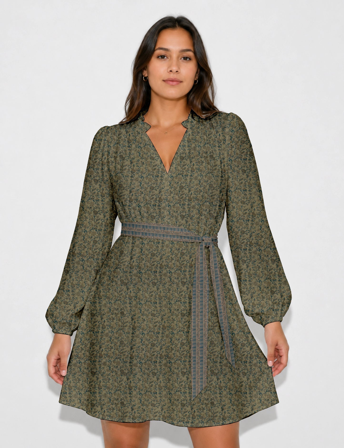 Swing dress with detachable tie belt, gathered ruffle neckline, full-length voluminous sleeves, elastic cuffs, and relaxed A-line silhouette in an above-knee length.