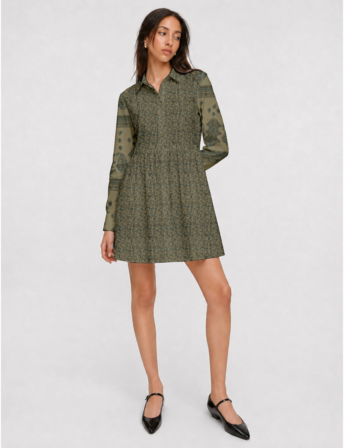 Short shirt dress with a relaxed A-line silhouette, point collar, partial button placket, gathered waist, side pockets, and full-length cuffed sleeves.