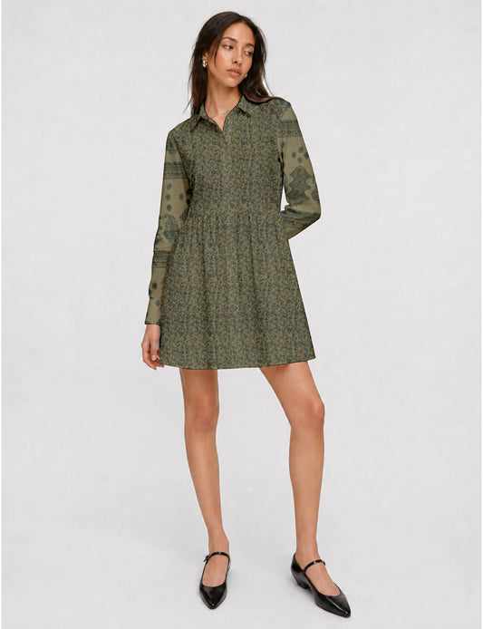 Short shirt dress with a relaxed A-line silhouette, point collar, partial button placket, gathered waist, side pockets, and full-length cuffed sleeves.