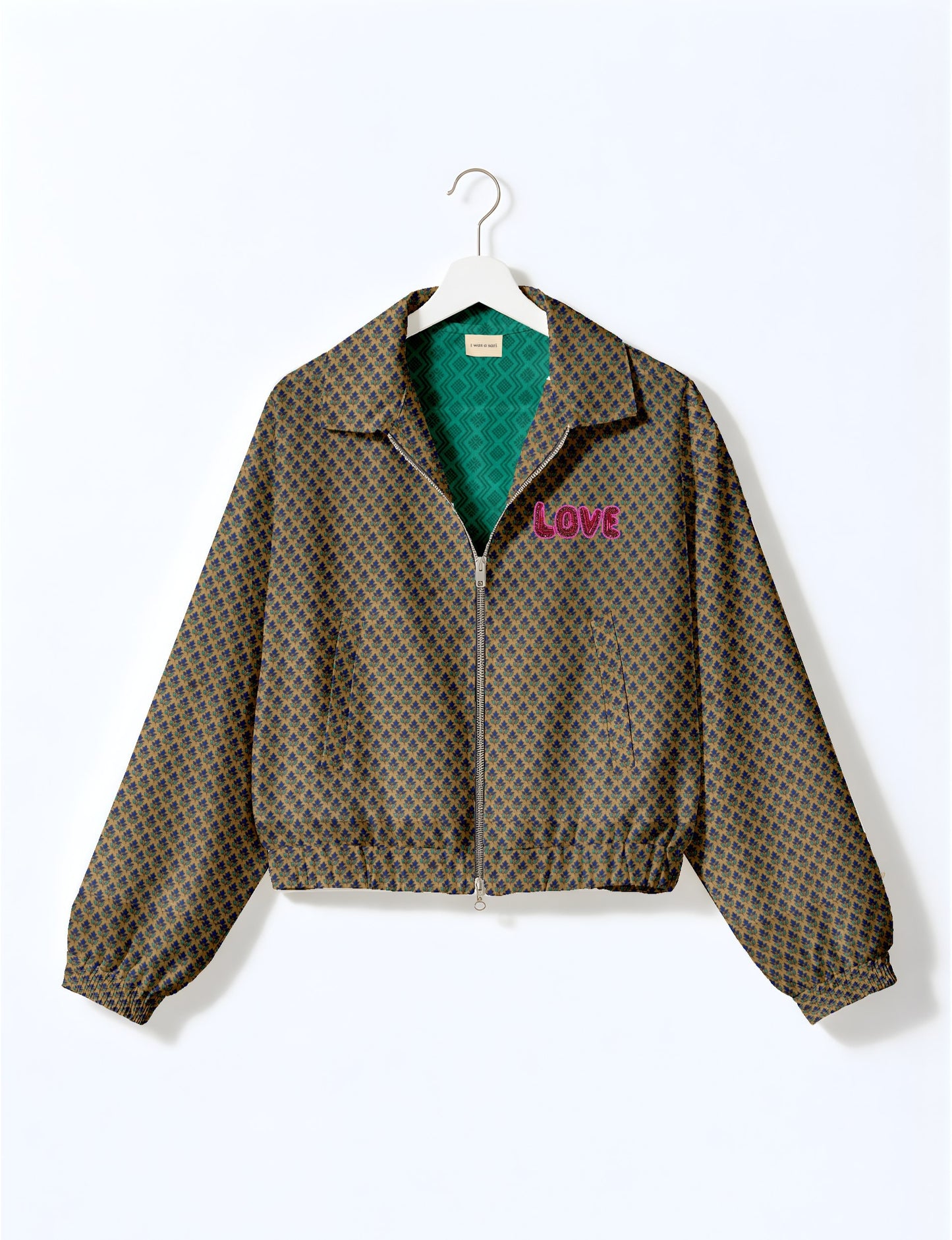 Love Bomber Jacket made from recycled fabric, featuring hand-stitched Aari embroidery. A unique piece of zero-waste clothing, part of the circular fashion movement. Designed with upcycled materials for a stylish yet environmentally friendly clothing choice.