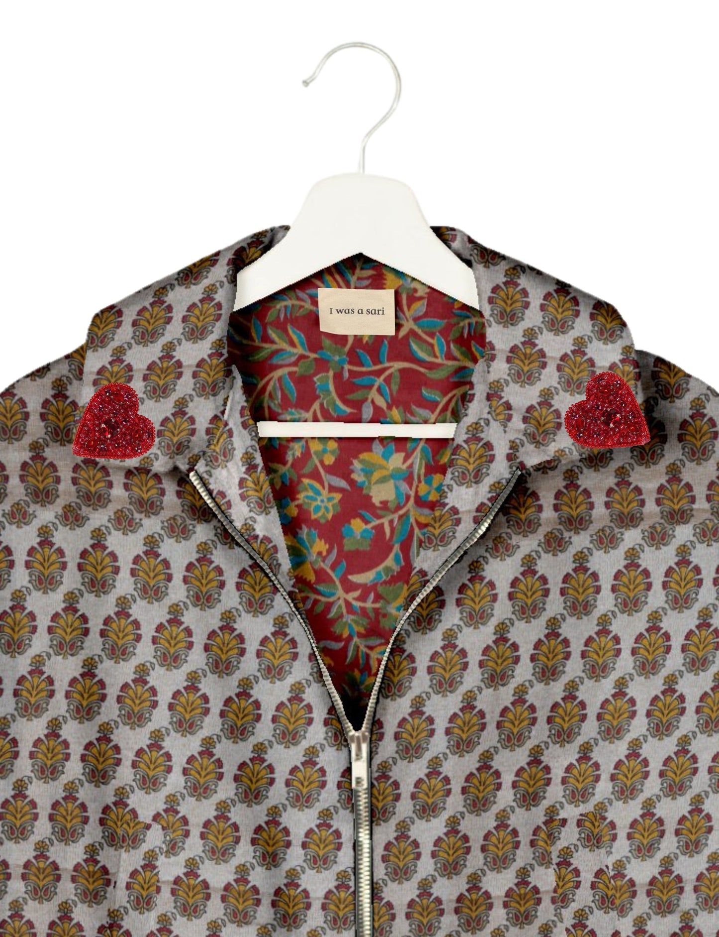 Make a bold statement with our Heart Drop Earrings, a symbol of conscious luxury and ethical fashion. Handcrafted using the intricate Aari embroidery technique, these earrings are made from upcycled sari fabric, embracing slow fashion and zero waste clothing. Elevate your look with sustainable apparel that supports fair trade fashion while reducing textile waste. Choose eco-friendly fashion that speaks of love, artistry, and responsibility.