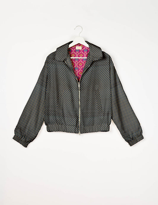 Upcycled Bomber Jacket made from recycled sari materials, featuring a cute cropped shape, elasticated hem and cuffs, and contrast sari print lining. Sustainable apparel promoting eco-friendly fashion and ethical clothing.