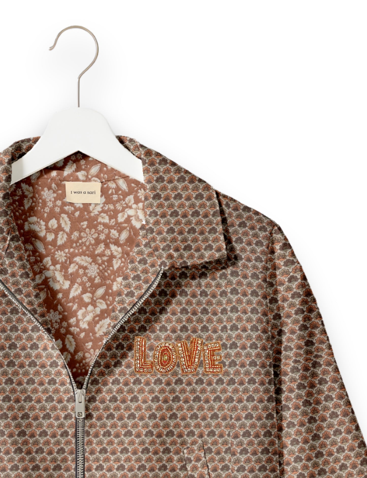 Love Bomber Jacket made from recycled fabric, featuring hand-stitched Aari embroidery. A unique piece of zero-waste clothing, part of the circular fashion movement. Designed with upcycled materials for a stylish yet environmentally friendly clothing choice.