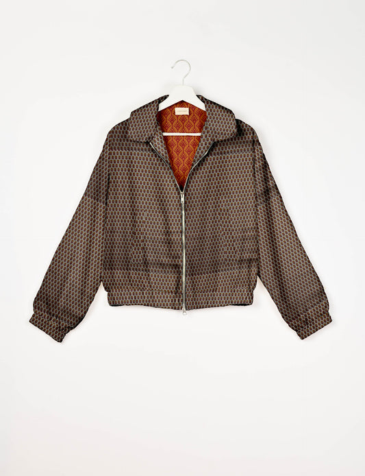 Upcycled Bomber Jacket made from recycled sari materials, featuring a cute cropped shape, elasticated hem and cuffs, and contrast sari print lining. Sustainable apparel promoting eco-friendly fashion and ethical clothing.